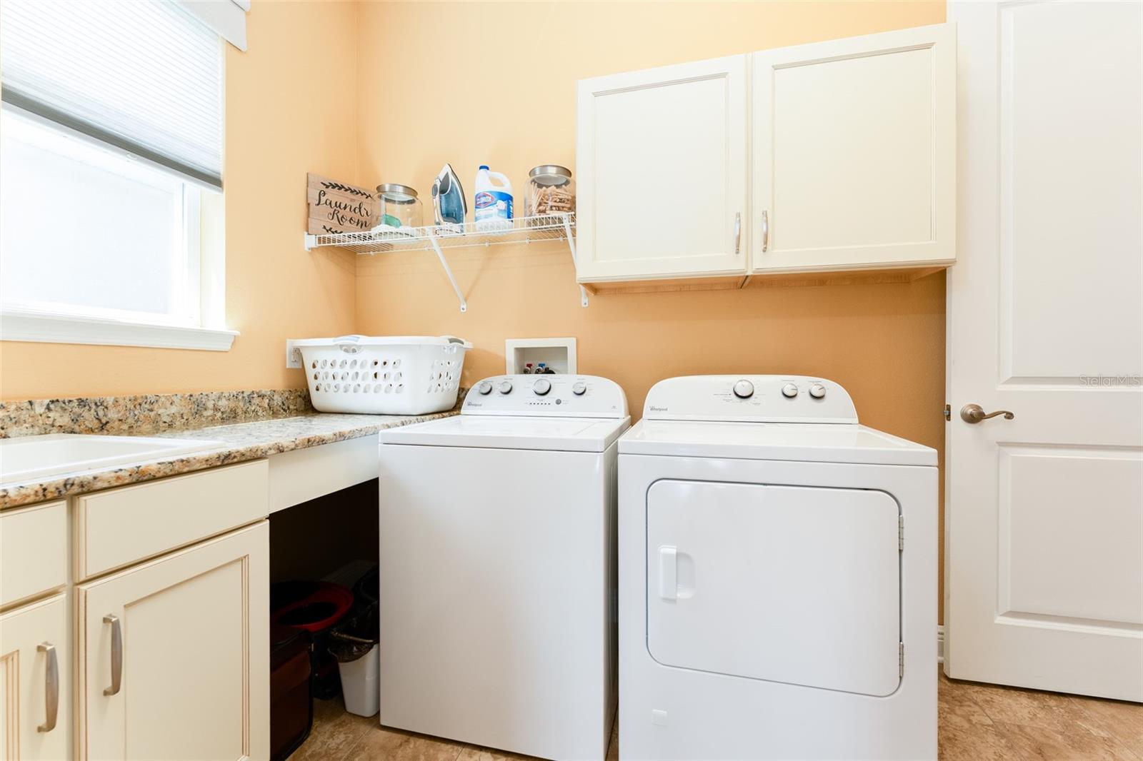 Laundry Room with Built in Utility Sink, Cabinets & Folding Shelf