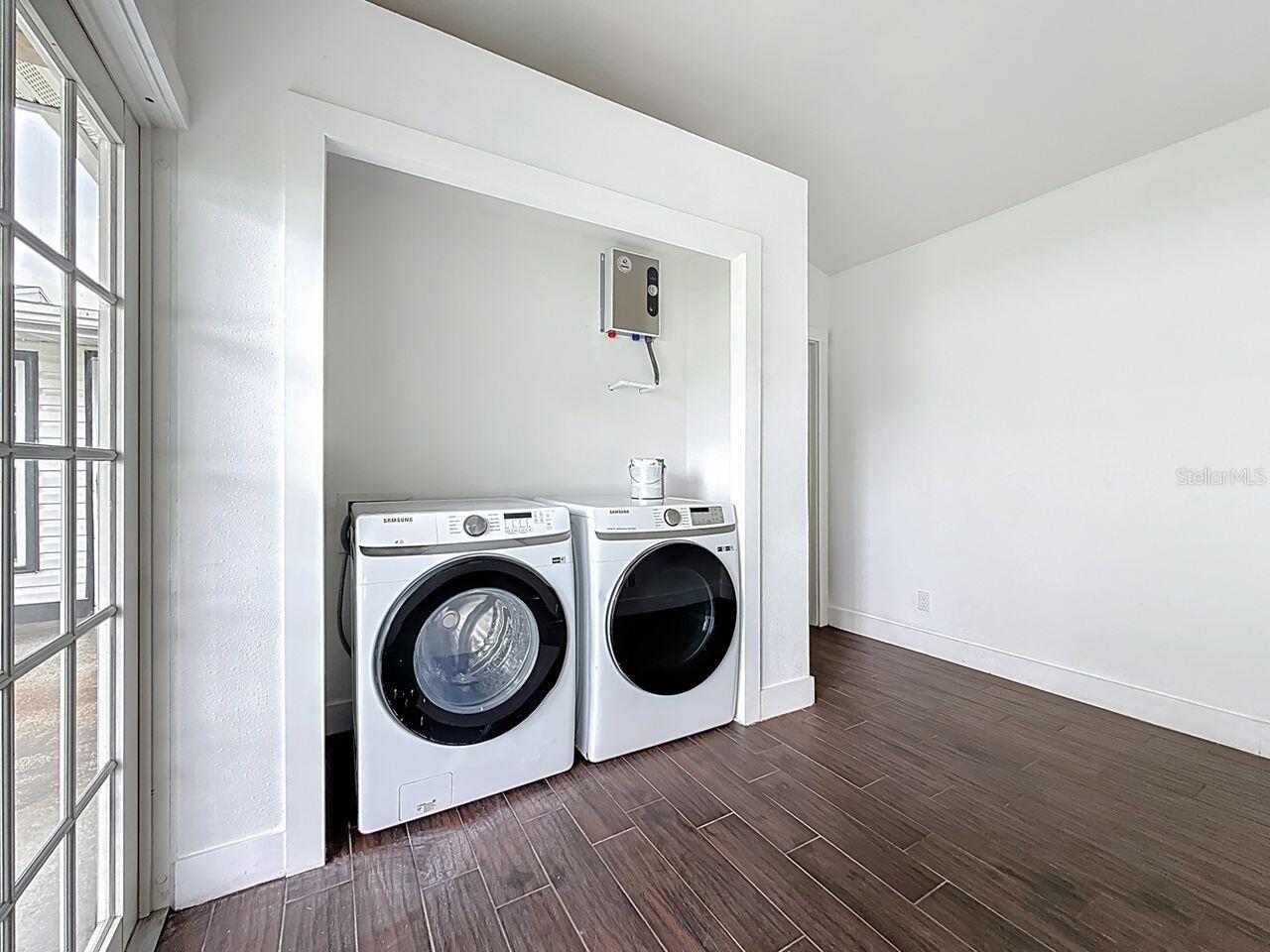laundry with tankless water heater