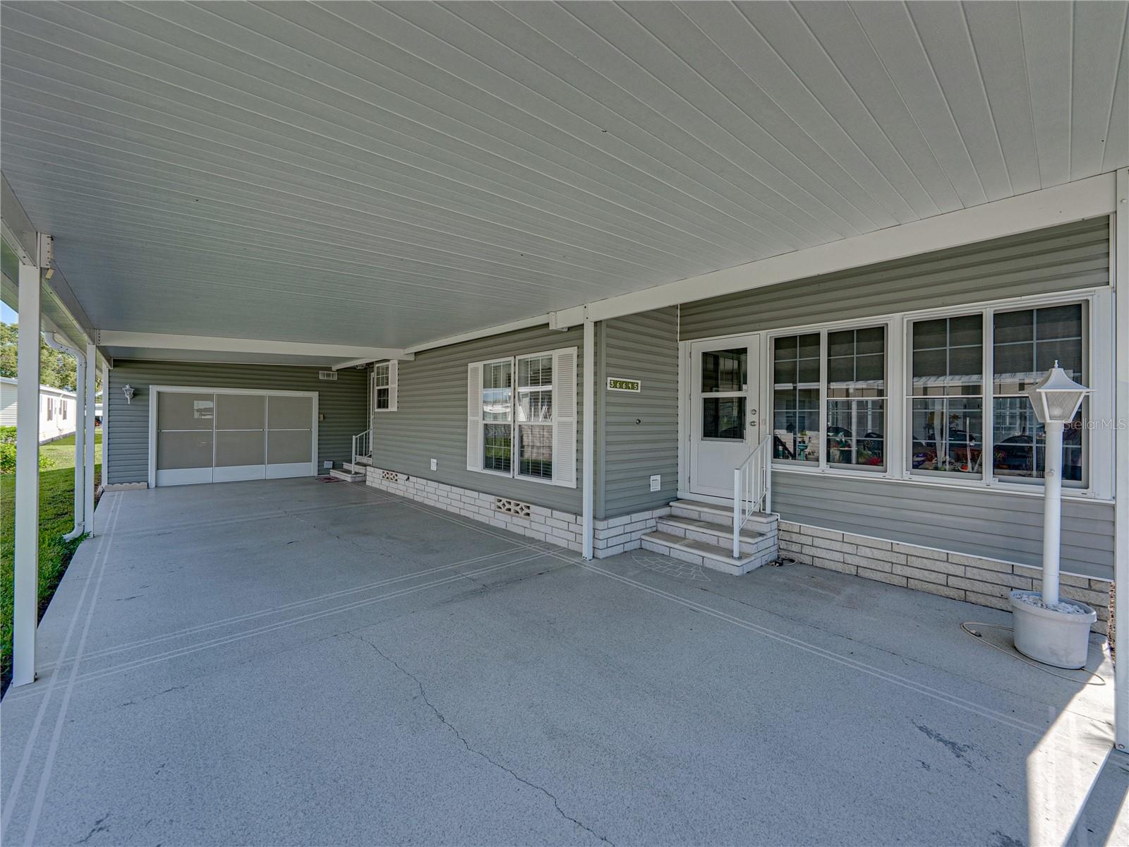 attached garage car entry and carport