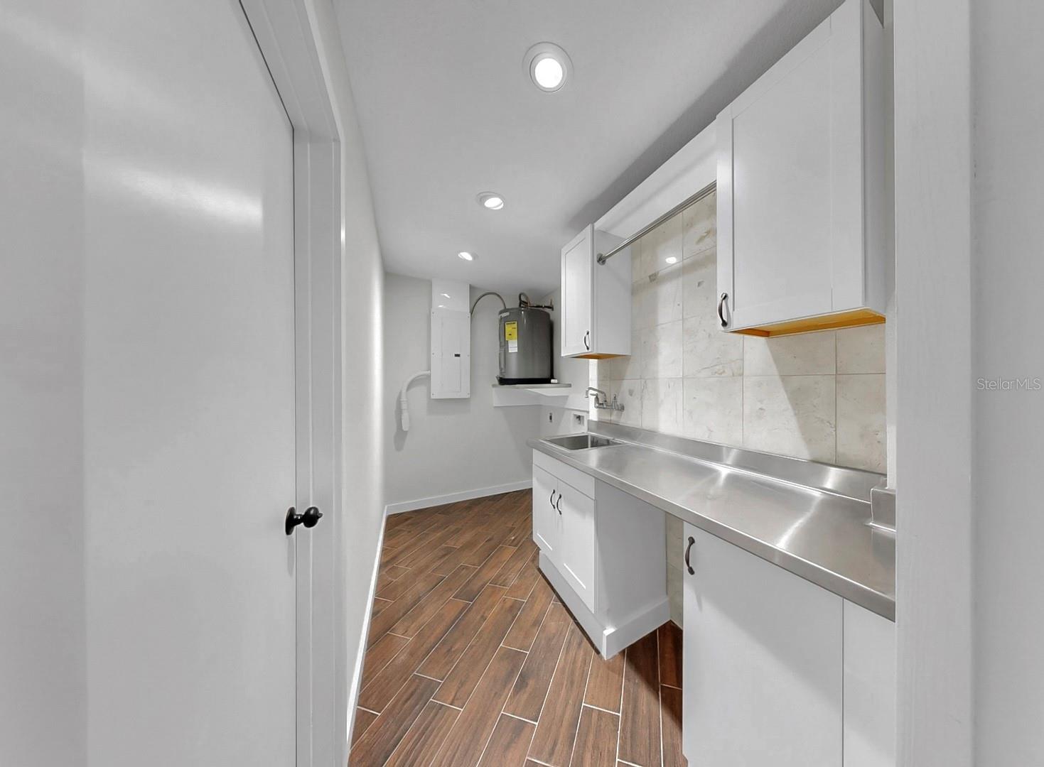 Laundry room with sink