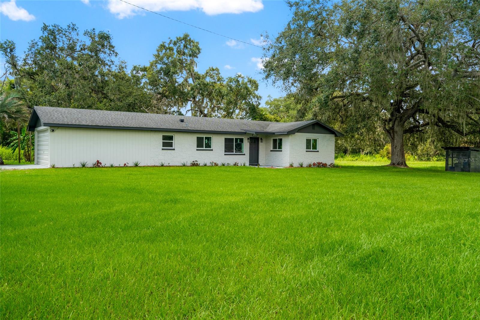 Beautifully remodeled 3 bed 2 bath 2 car garage home on 10 acres