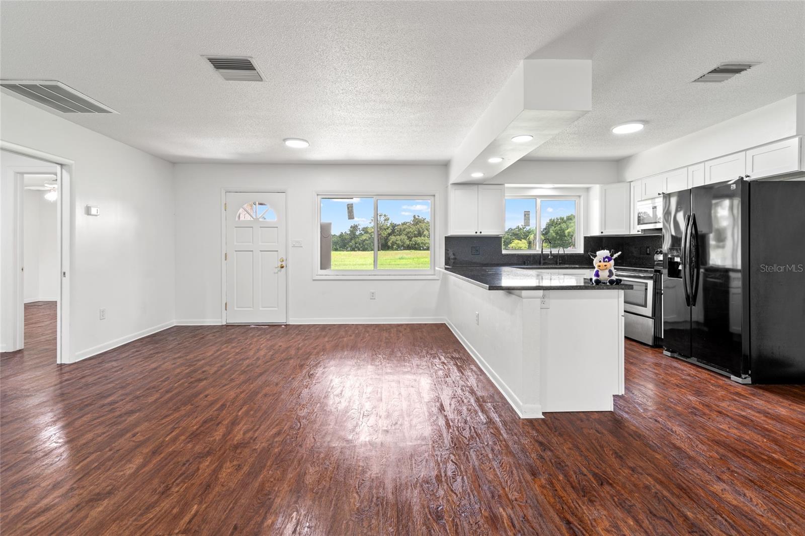 Open floor plan with new LVP flooring