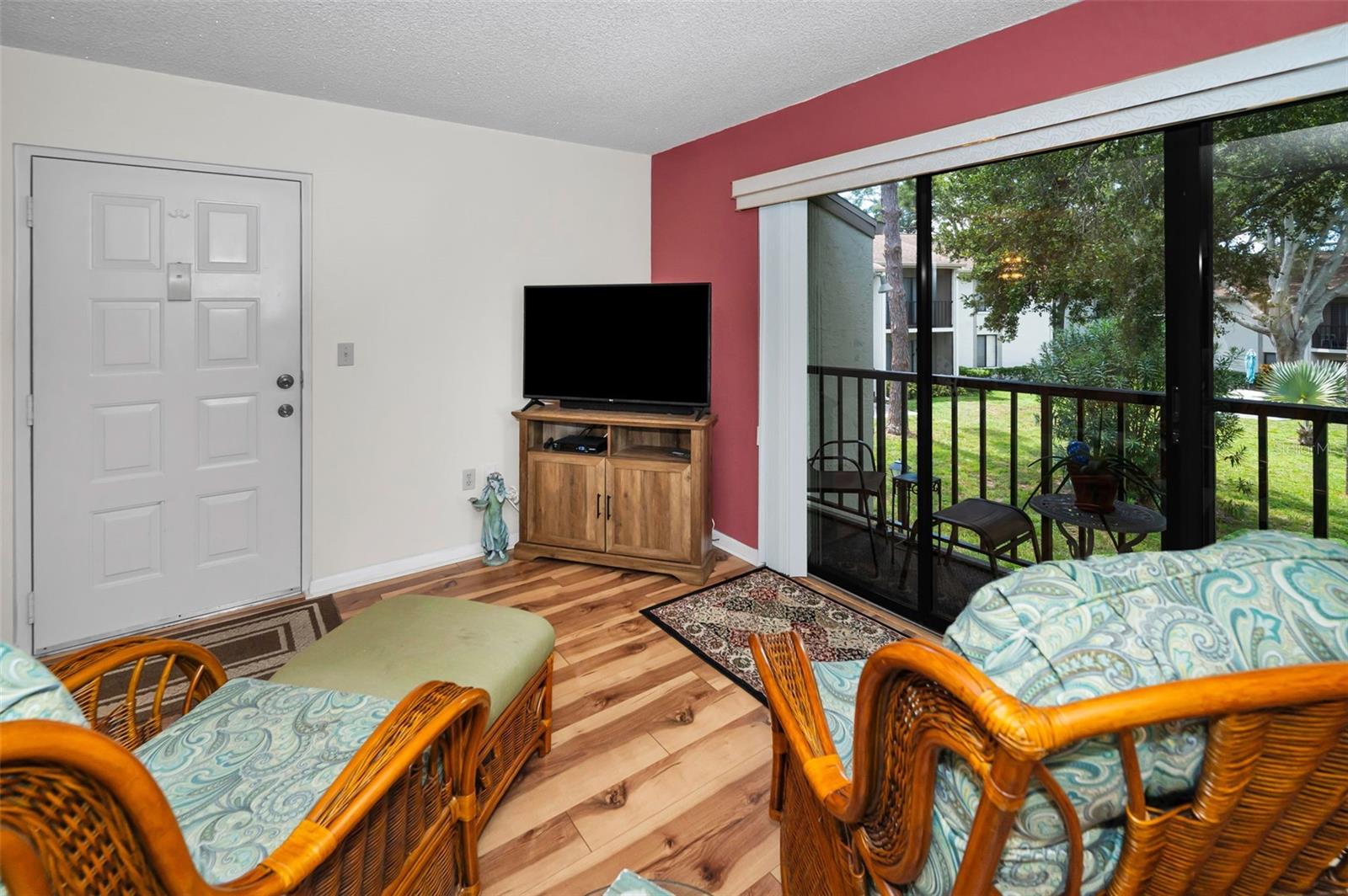 View of living room toward front door