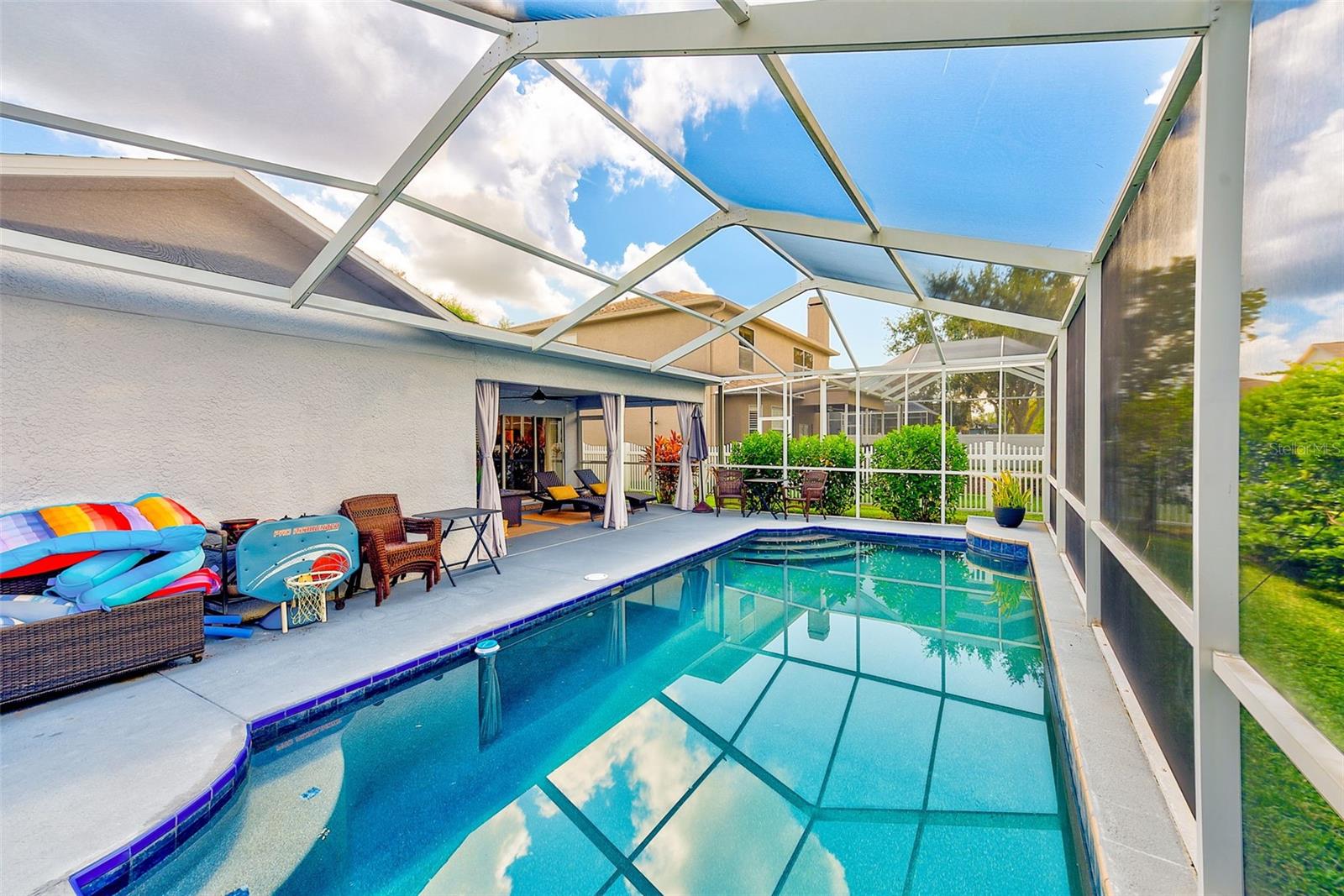 Sparkling private pool with Pebbletech surface