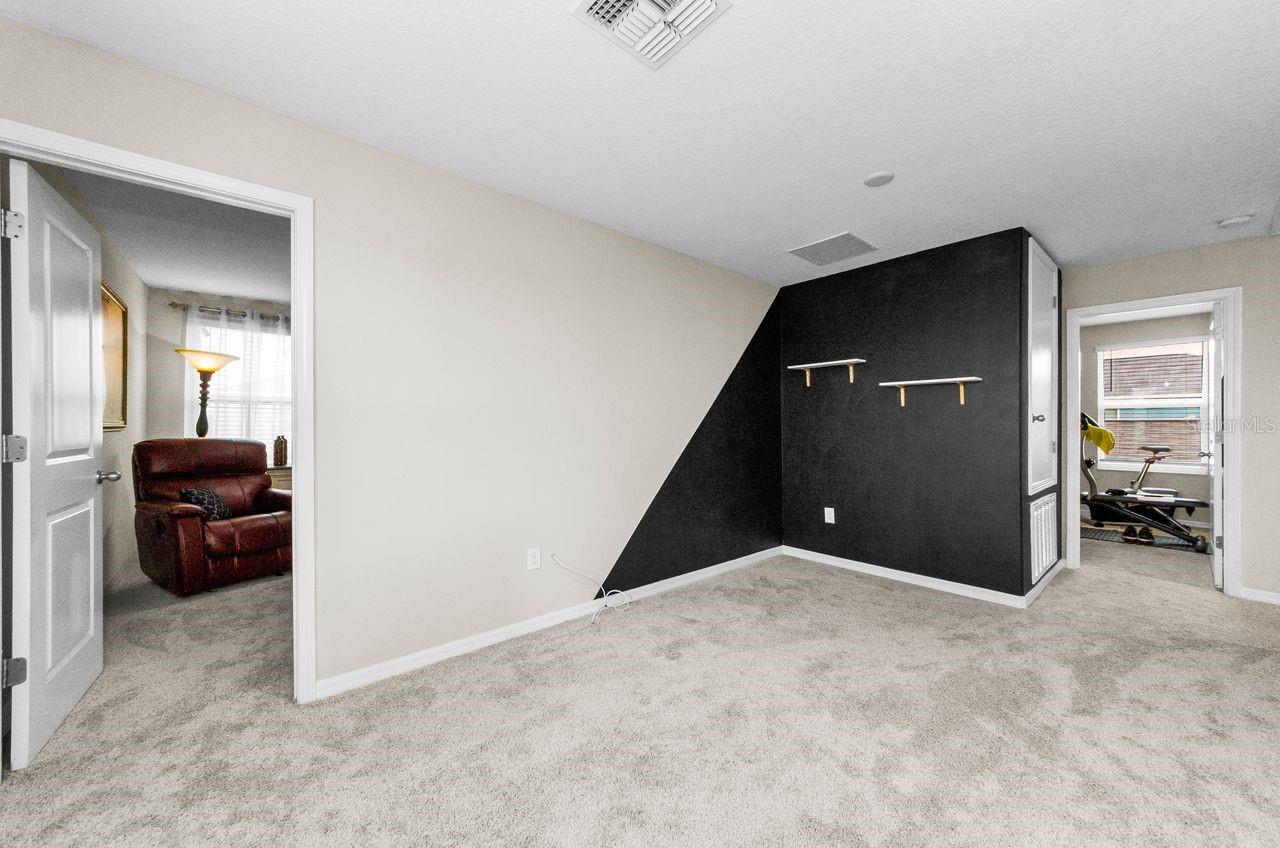 spacious loft / flex room could be an office, play area or workout space