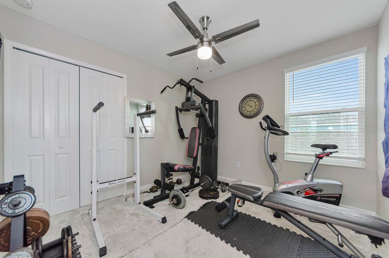 Bedroom 4, currently set up as a workout space