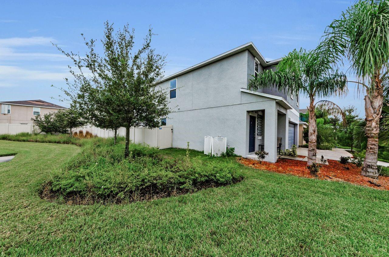 large community greenspace on side of home