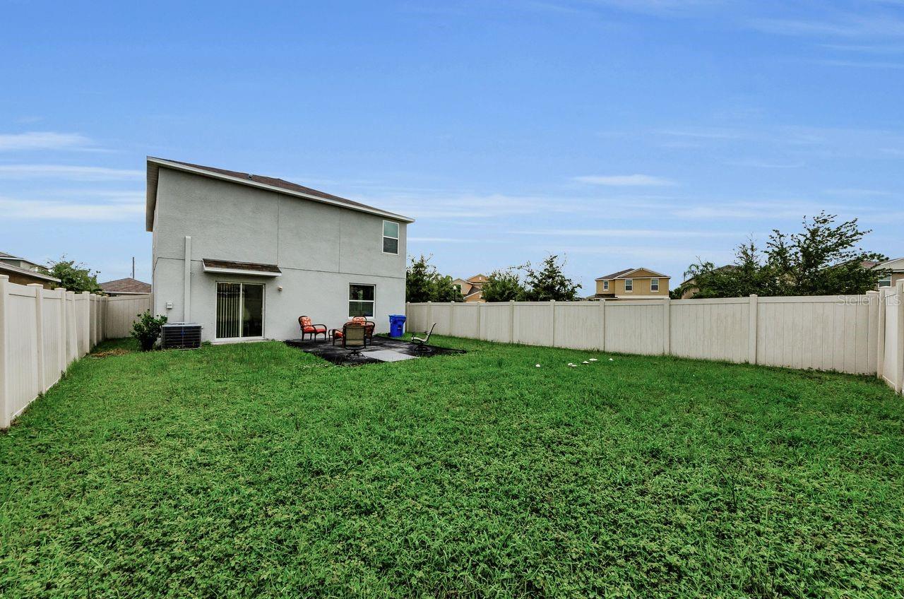 Large backyard that community mows too!