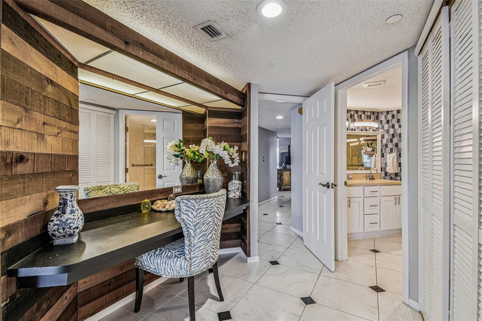 Wood wall desk in master bedroom