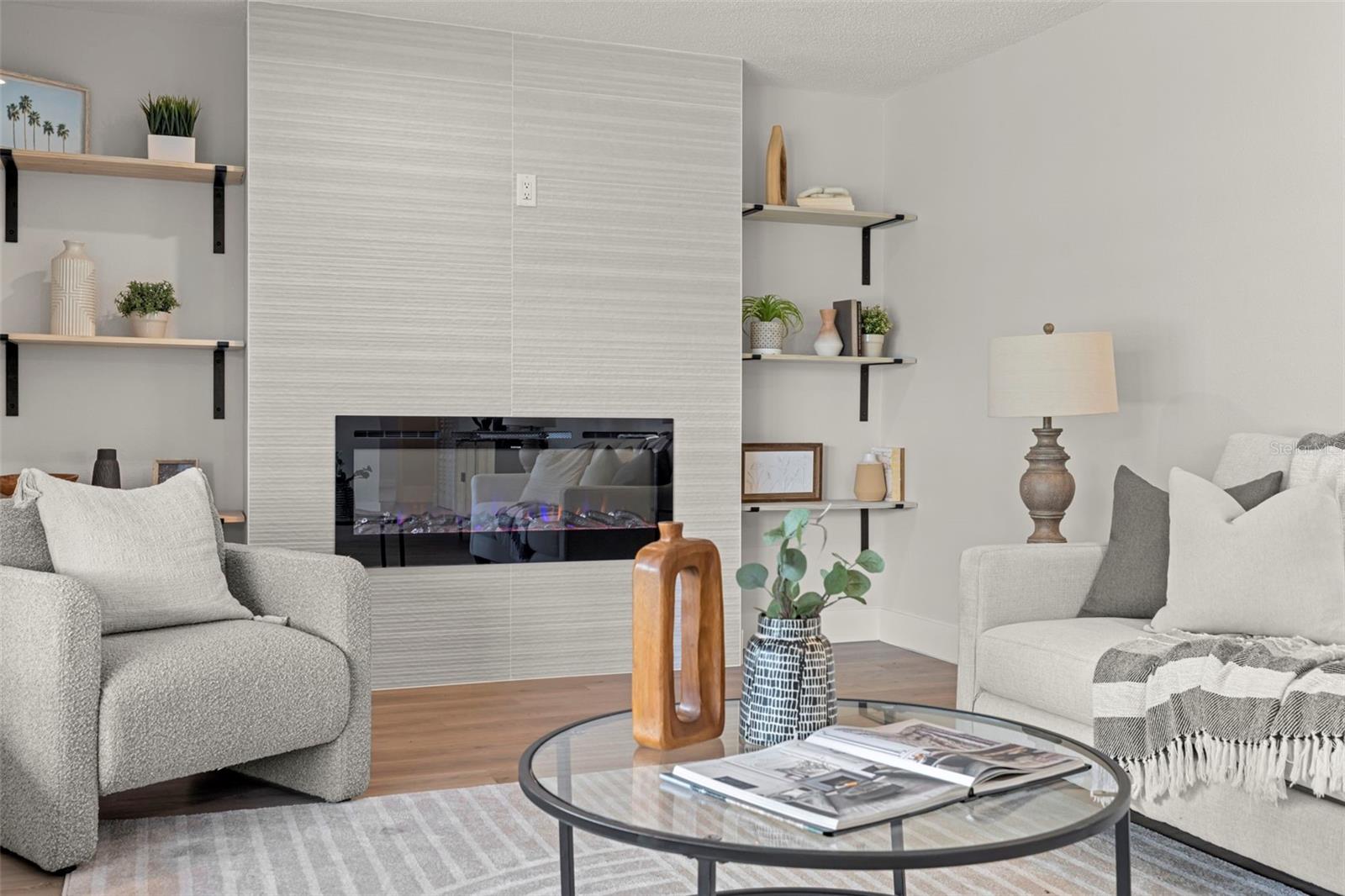 Tile electric fireplace wall with floating shelves for display