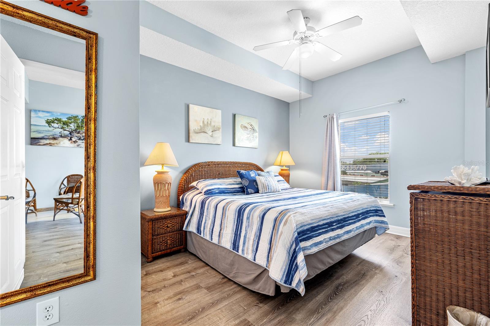 Comfy king size bed in the primary suite offers a great retreat while on vacation