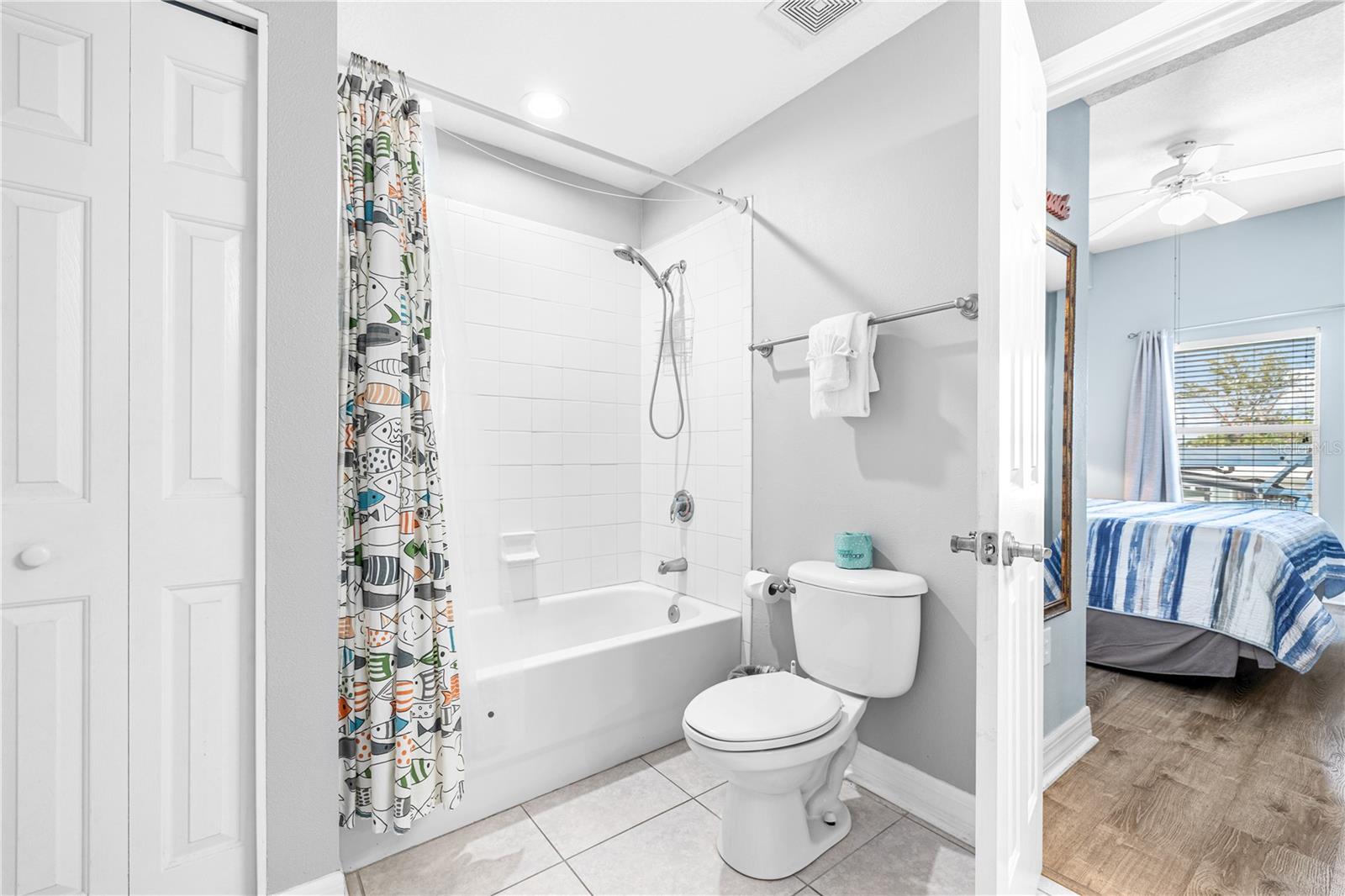 Large bathroom offers private access from the primary suite as well