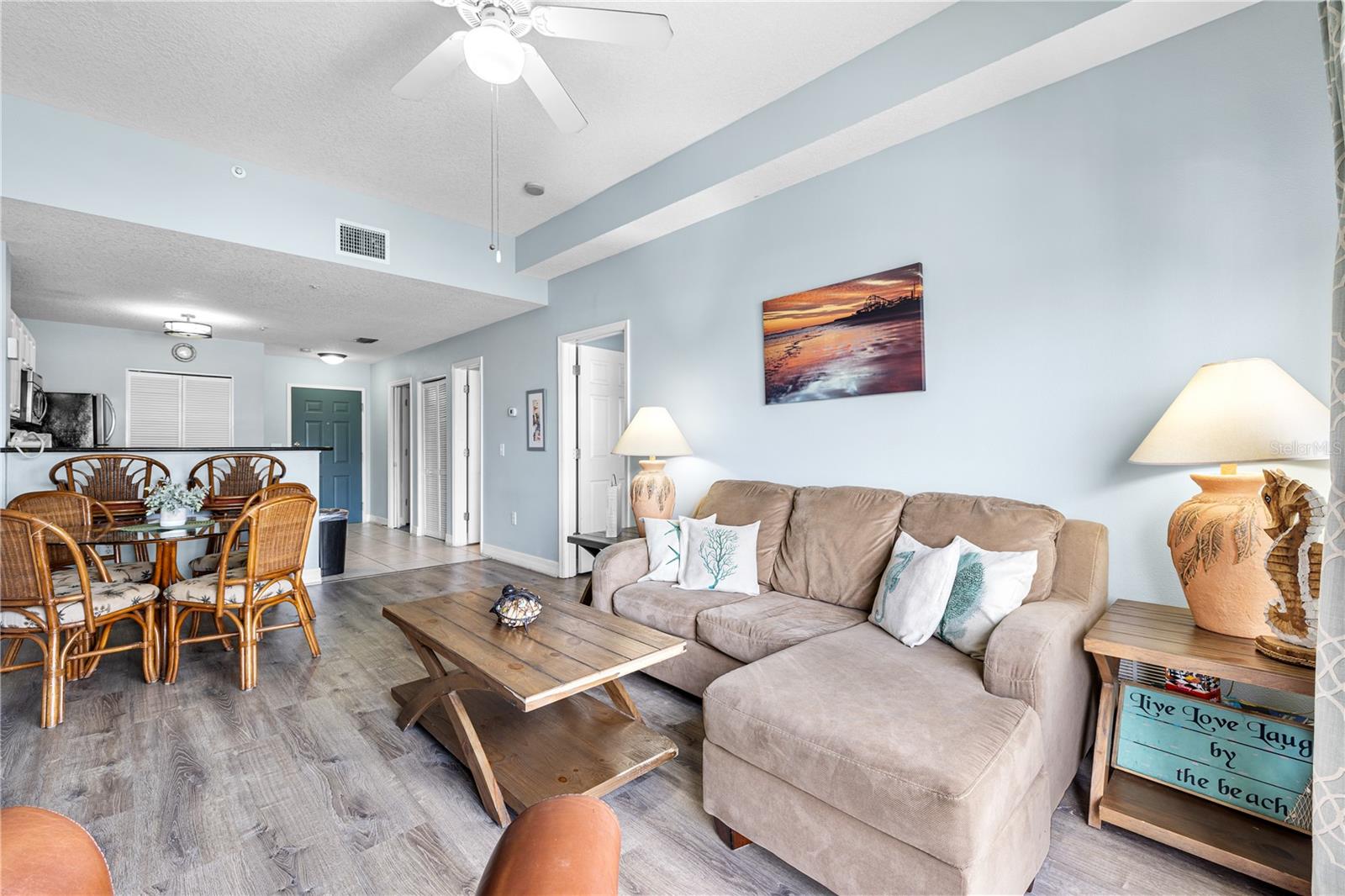 Open floor plan with newer luxury vinyl plank flooring throughout