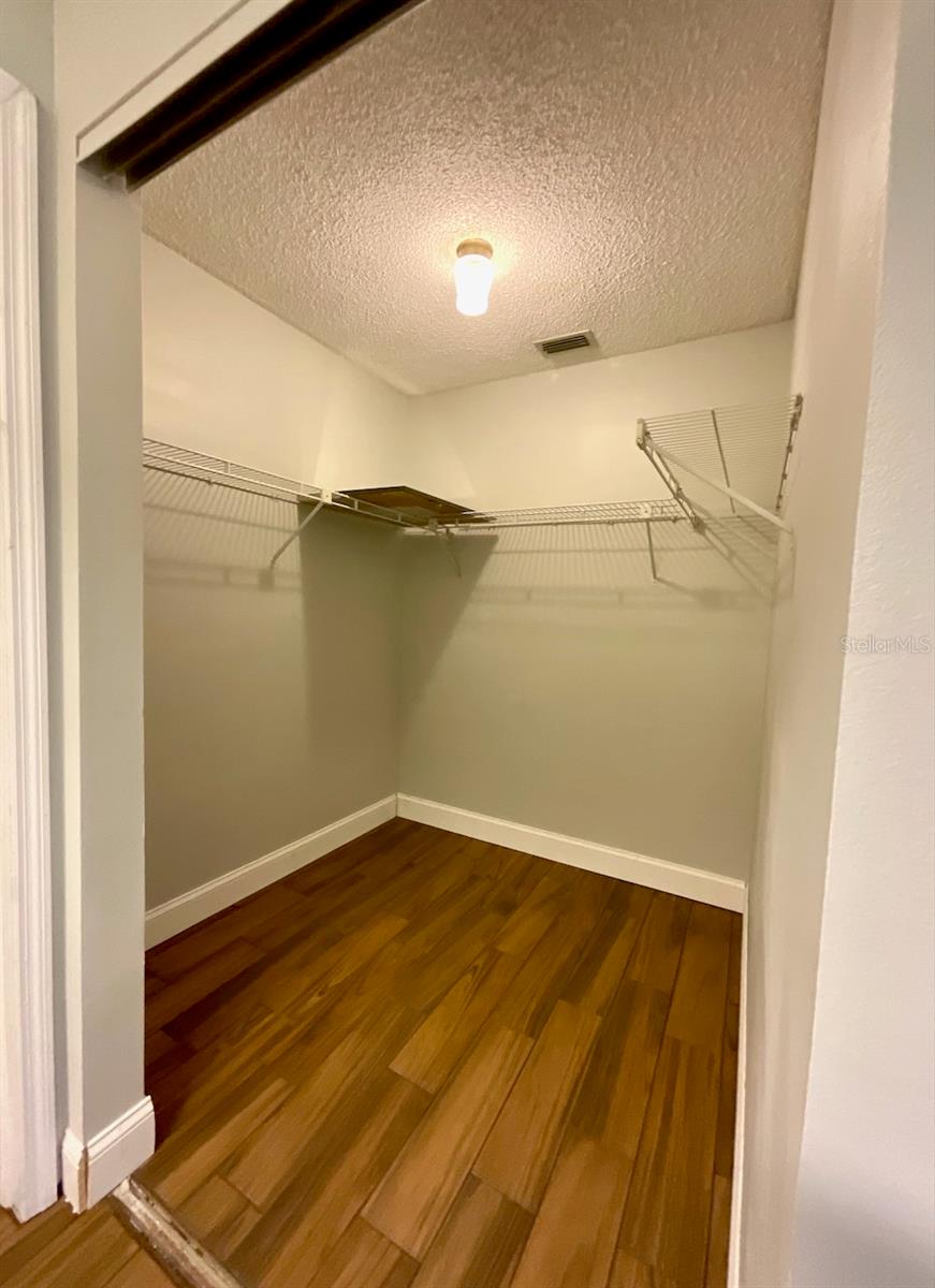 18-Primary Bedroom walk-in closet