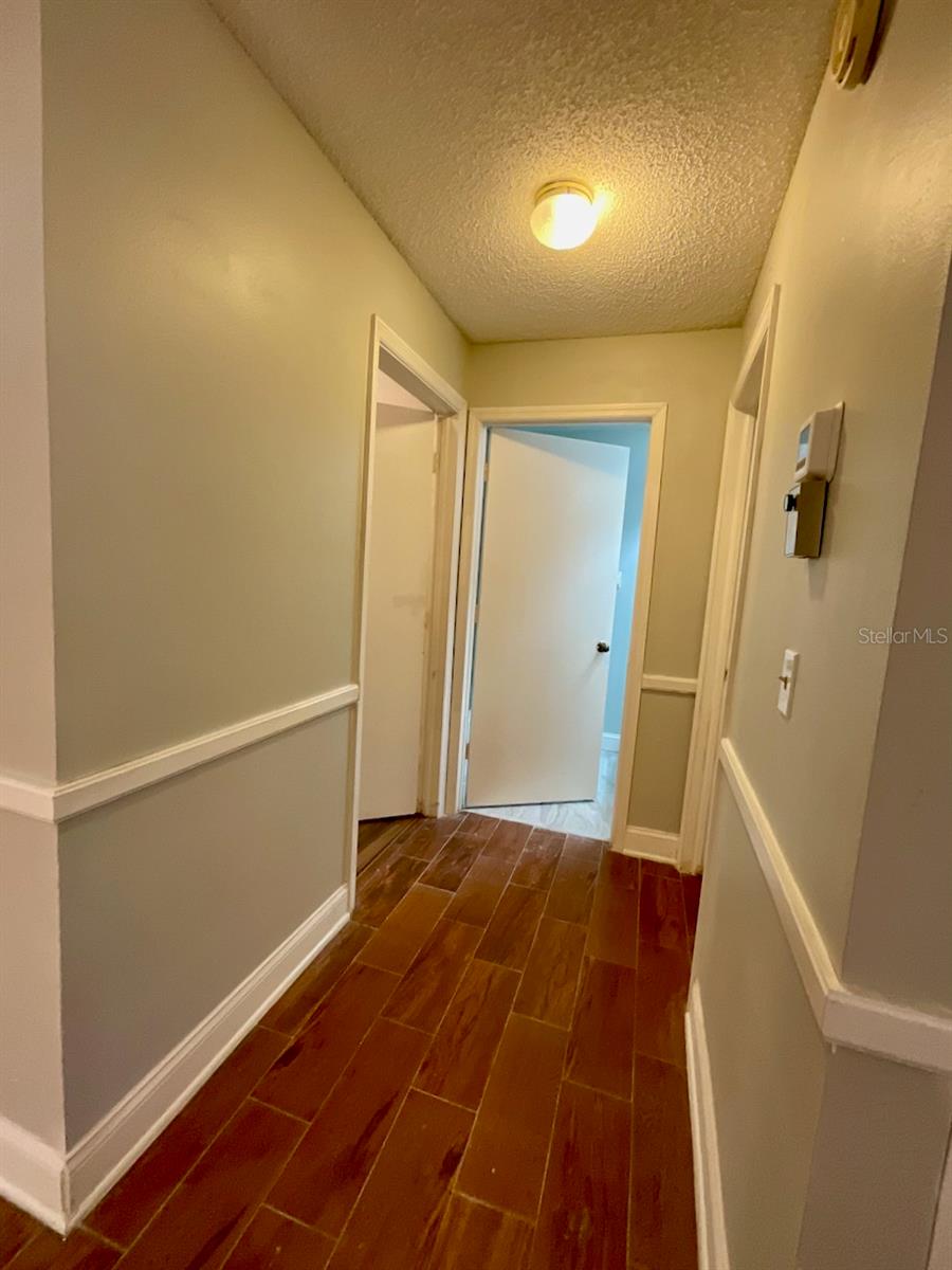 19-Hallway to Laundry room, guest bathroom, and front guest bedroom