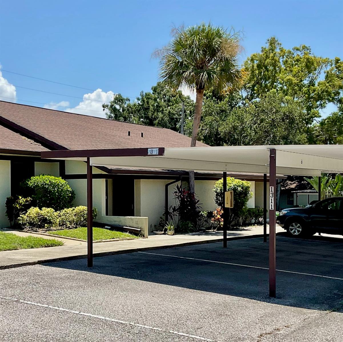 25-1311 carport space #9 by front door