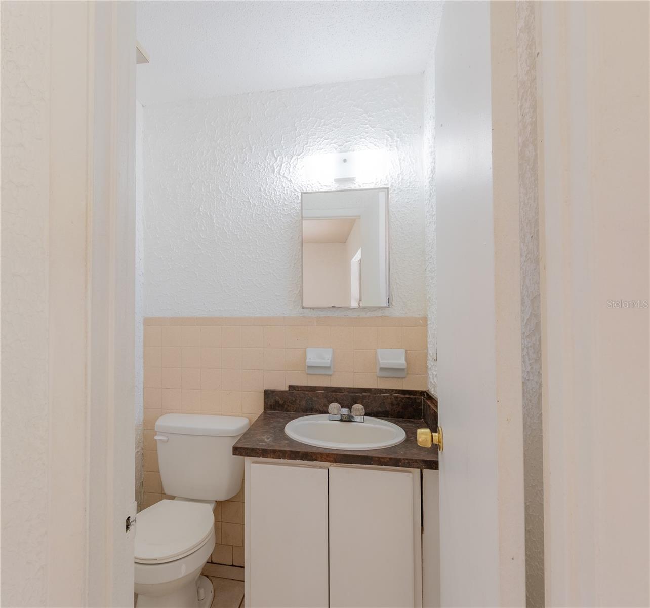 Half bath off primary bedroom.