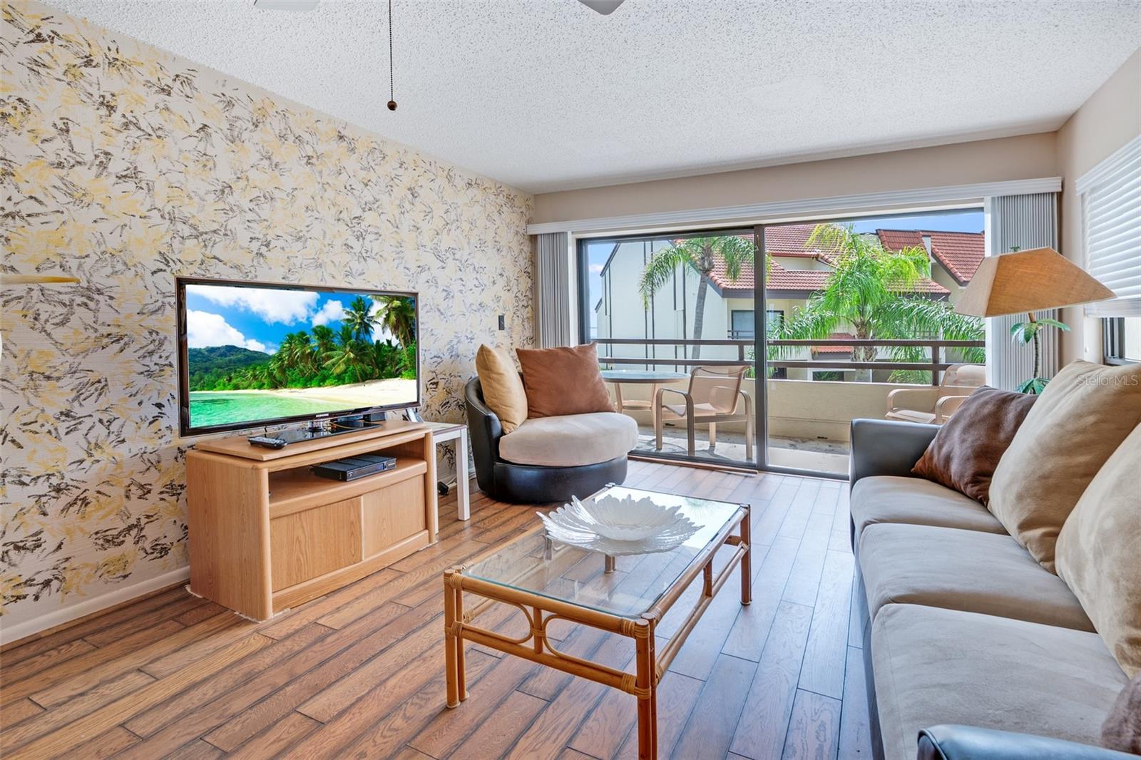 Spacious living room leading to balcony