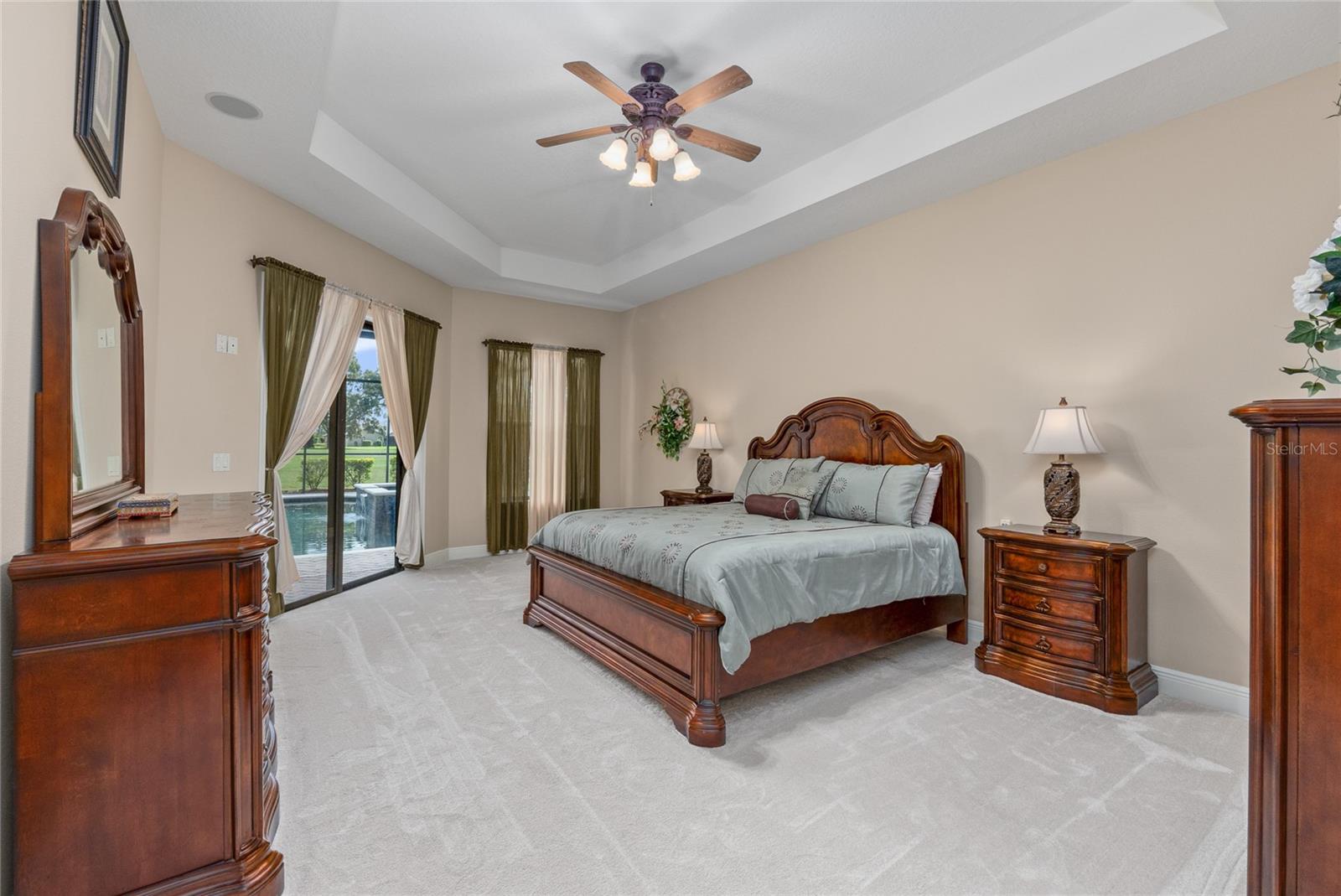 Primary Bedroom is spacious and has a tray ceiling