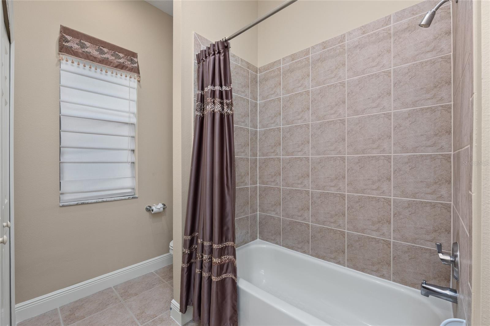 Bathroom 2 has a Shower/Tub combo