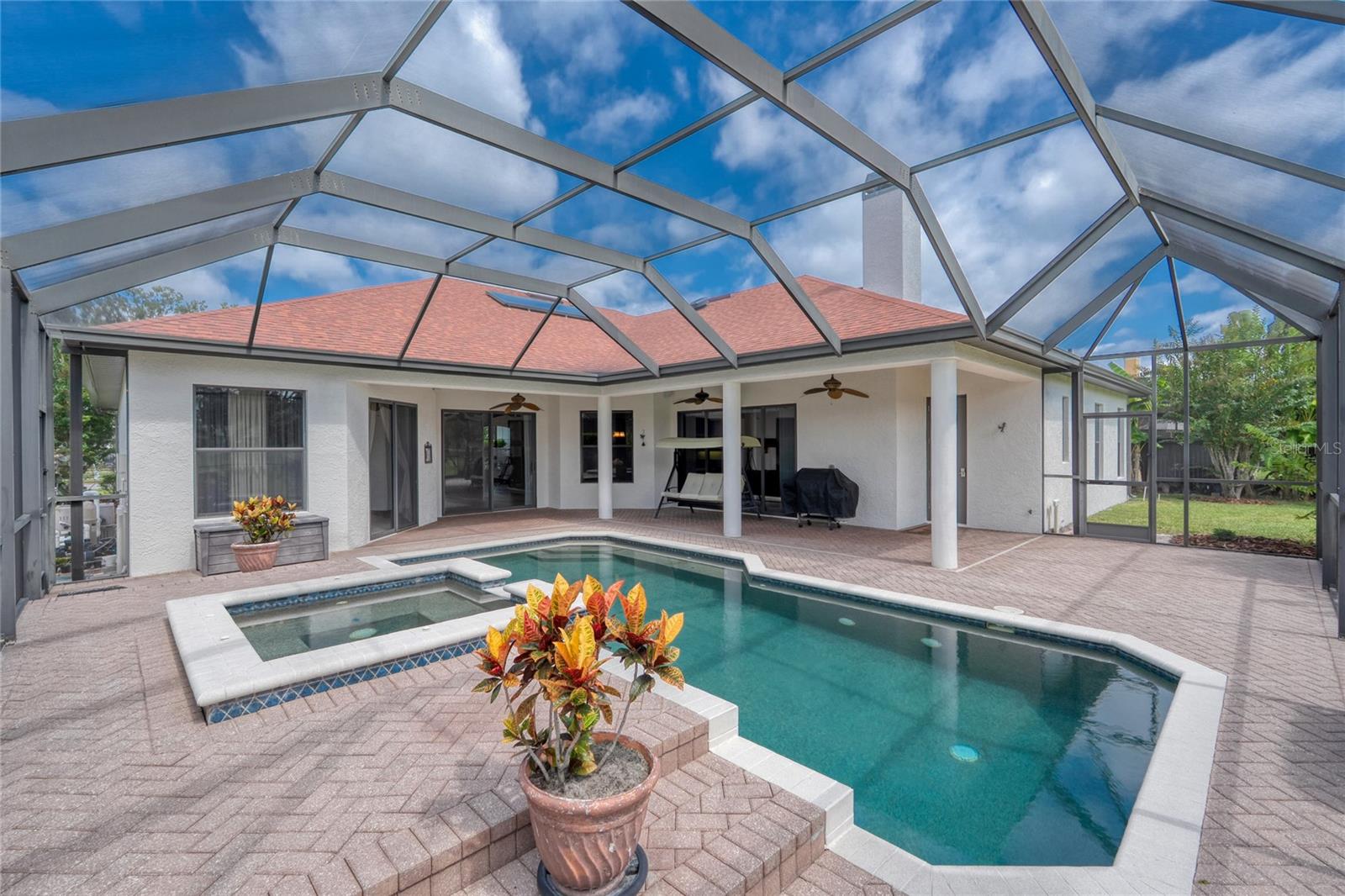 View of the paver Lanai and pool area