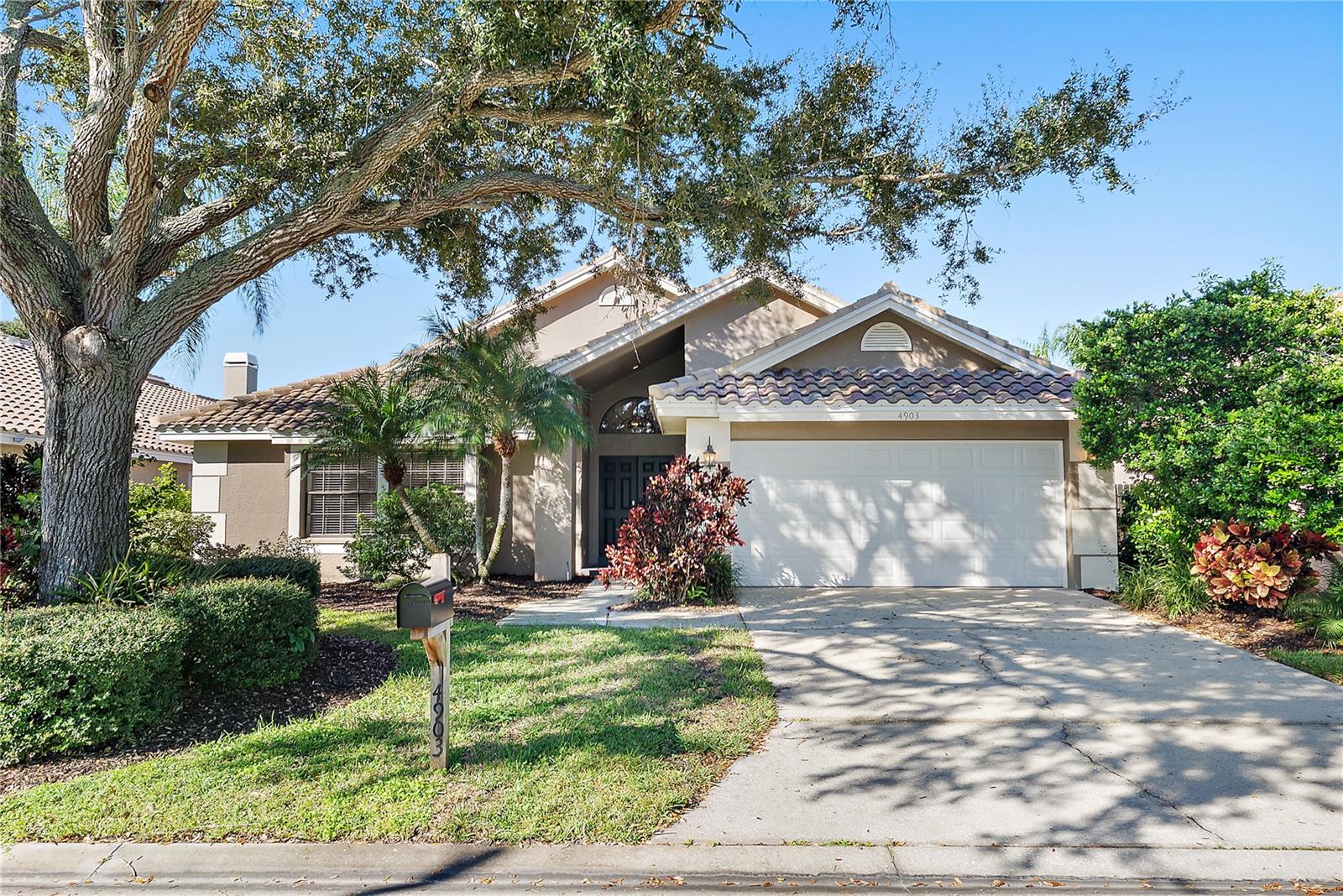 welcome! attractive 3/2 with newer tile roof