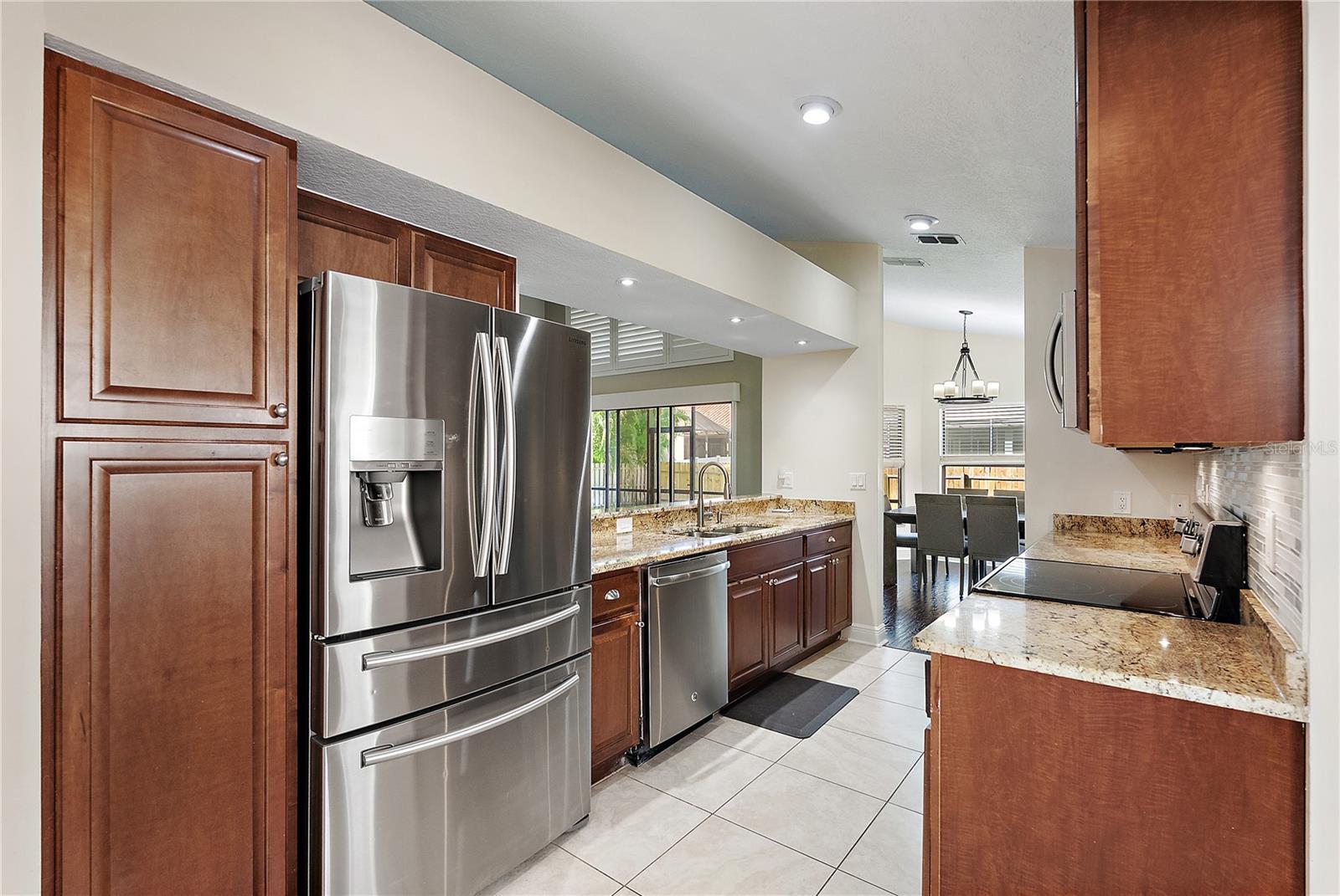 galley kitchen open to great room