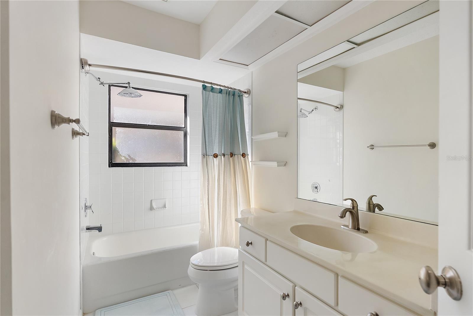 bathroom includes a linen closet too