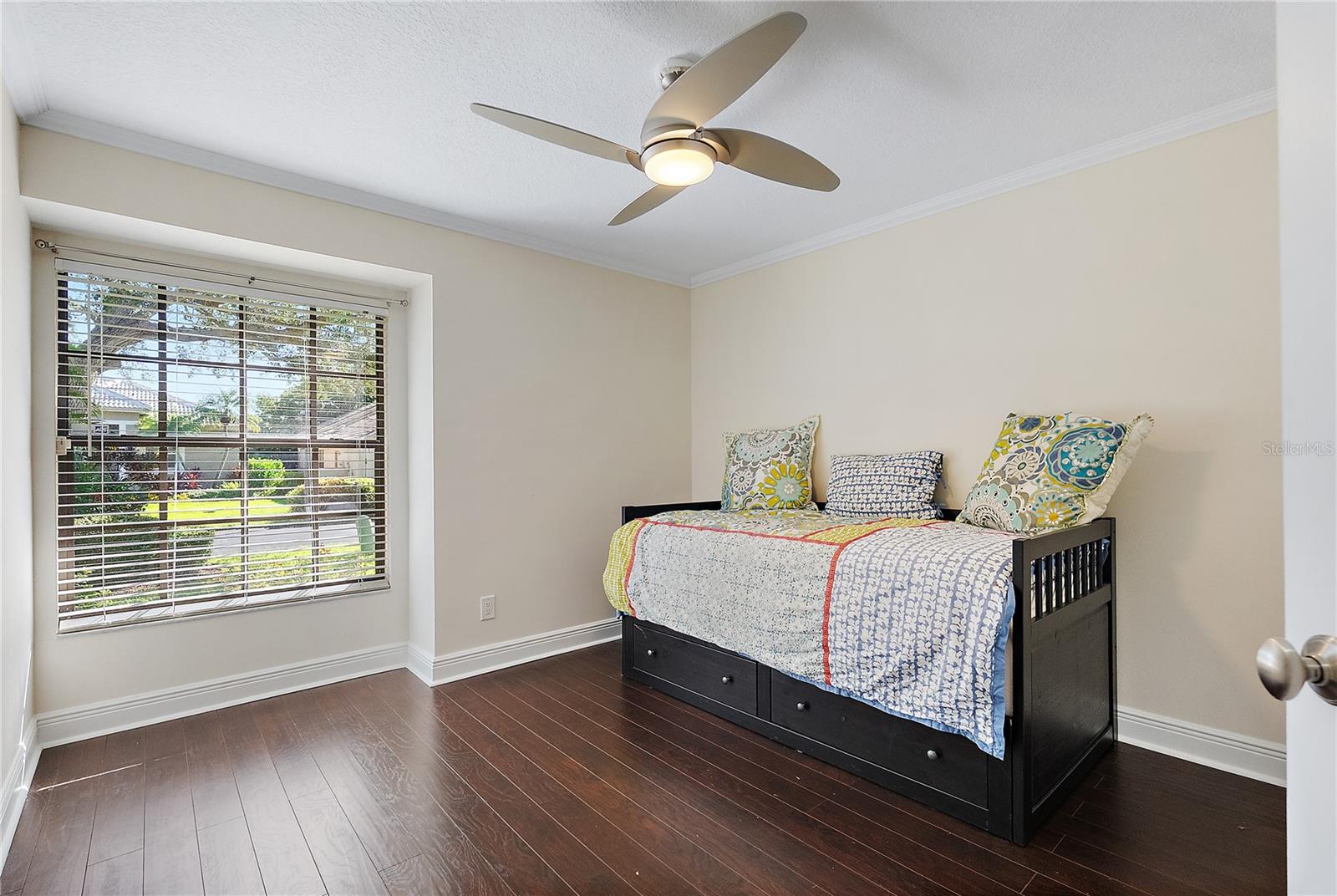 bedroom 3 in front of the home with nice window for natural light