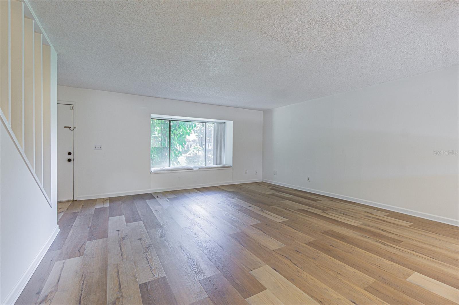 Living room with window seat storage
