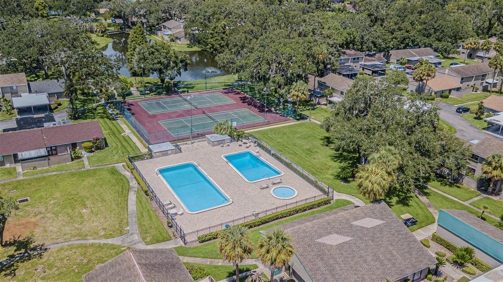 Clubhouse, two pools, spa, and two tennis courts.