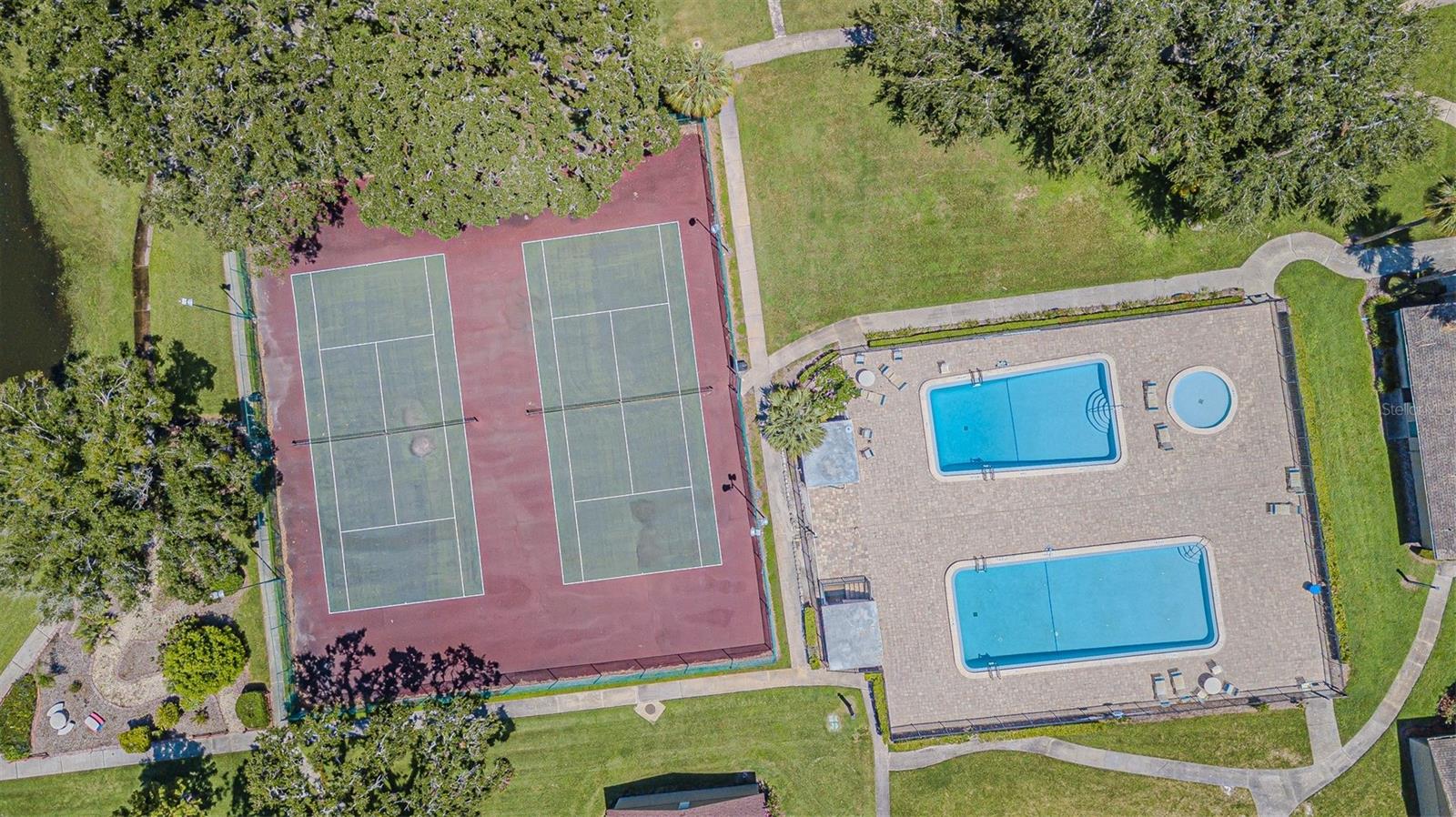 Clubhouse, two pools, spa, and two tennis courts.