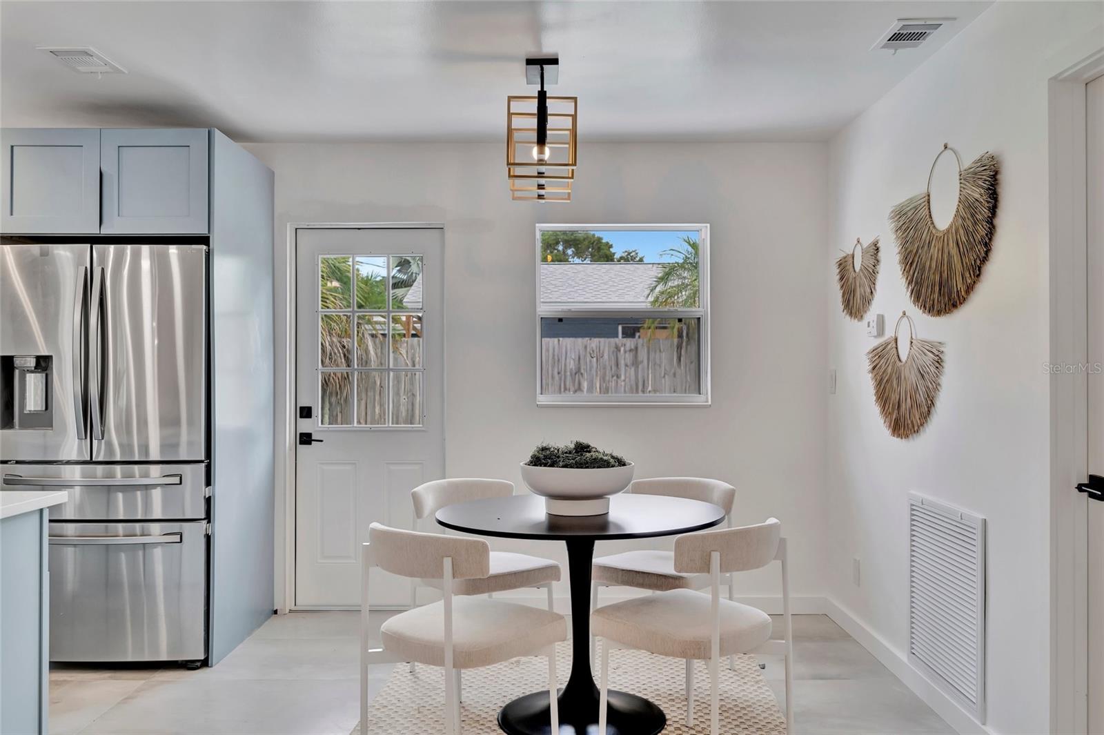 The Dining Area and the door leading to the backyard