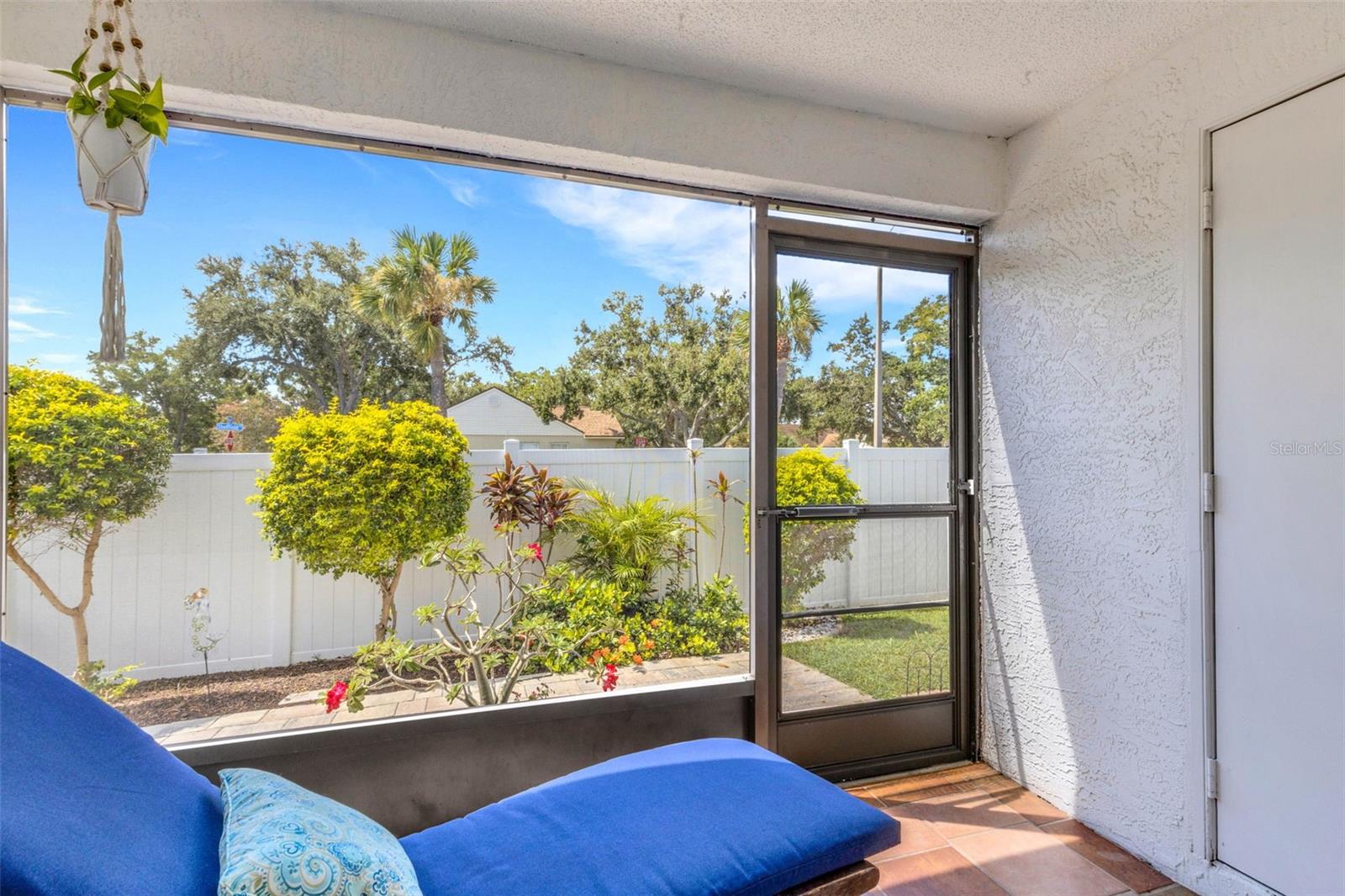 Screen enclosed porch with storage closet