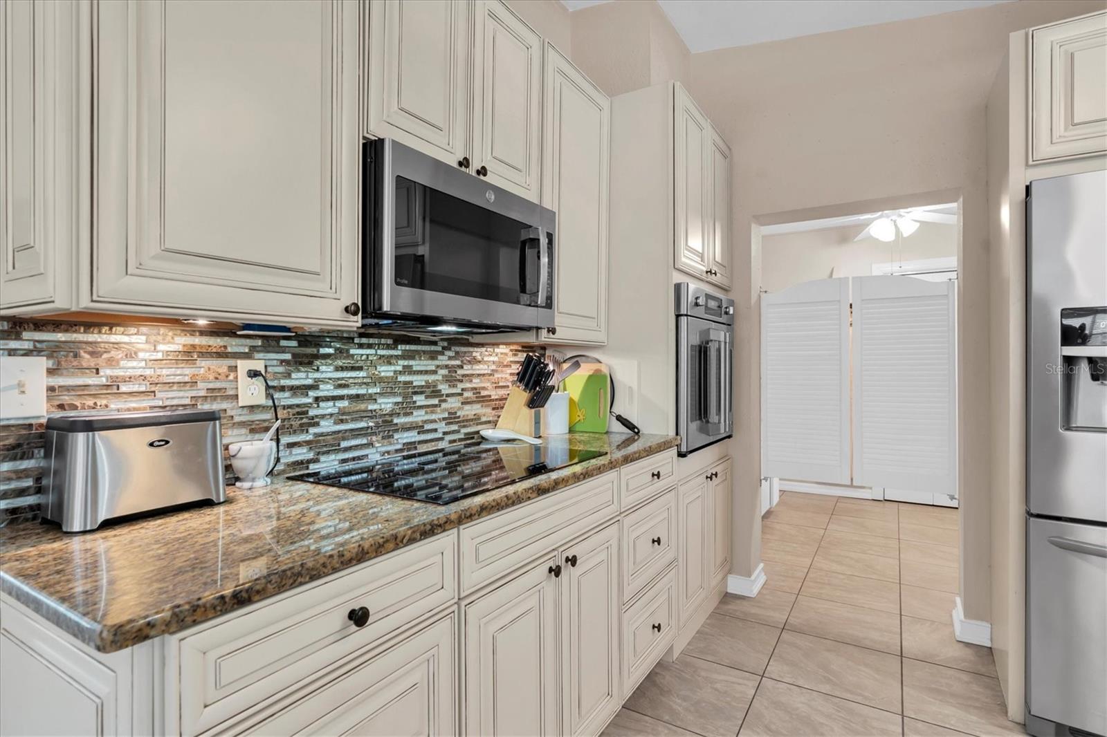 Designer backsplash - under cabinetry lighting