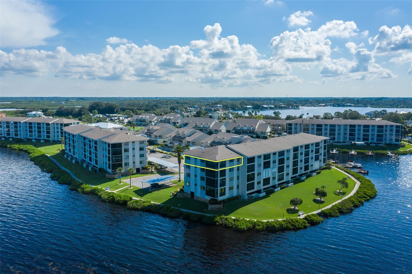 Most magnificent views of the river and Gulf direct sunsets from this top floor end unit.