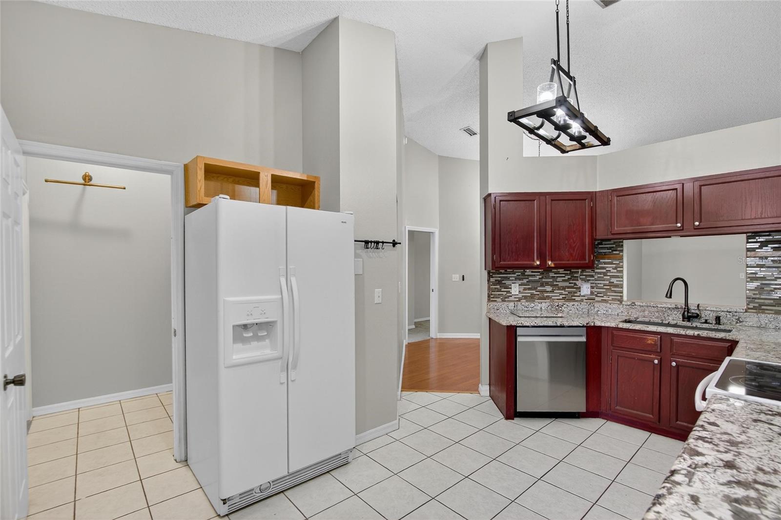 Laundry Room is next to Kitchen
