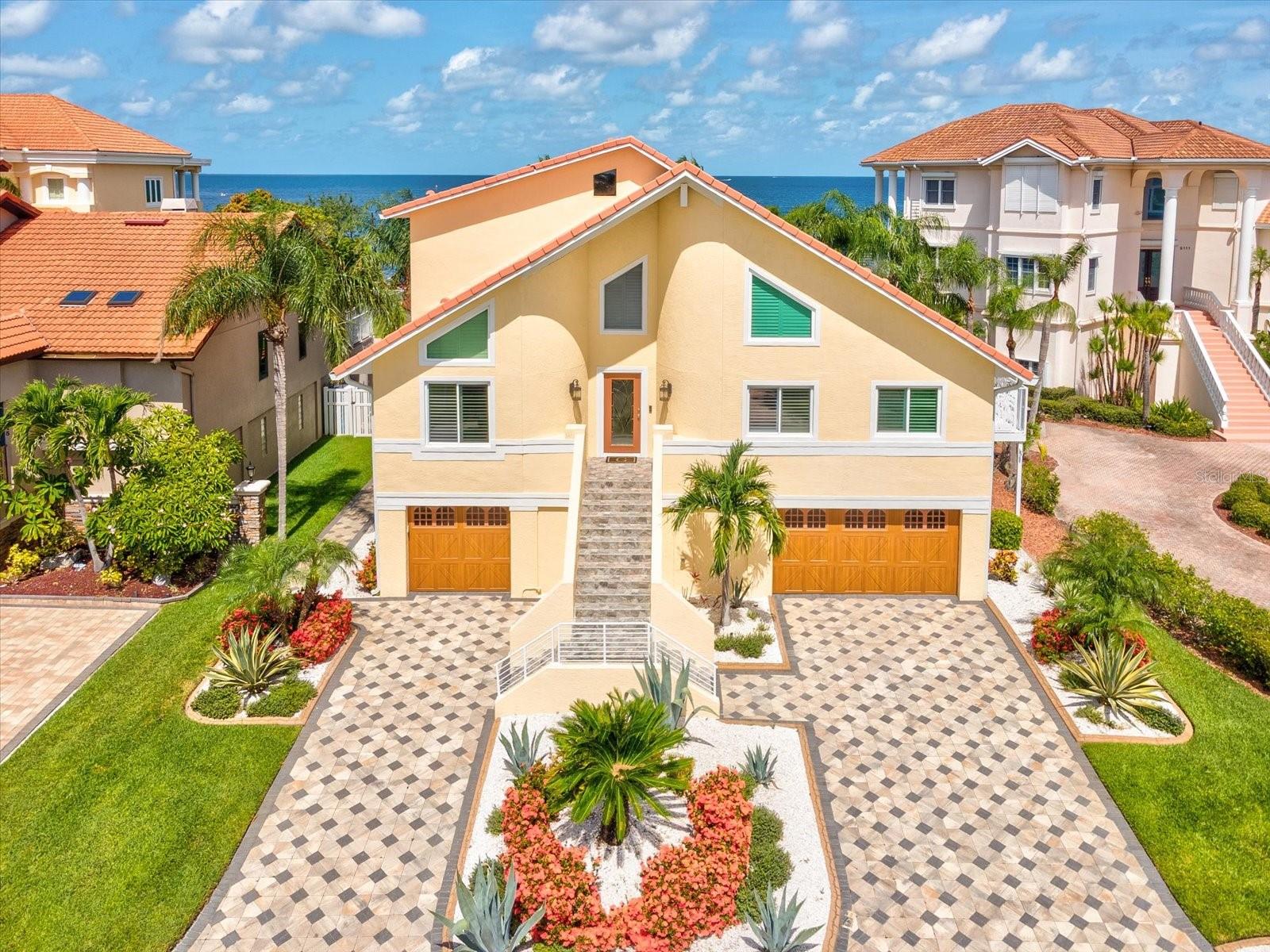 Experience unparalleled coastal grandeur at 5101 Westshore Drive