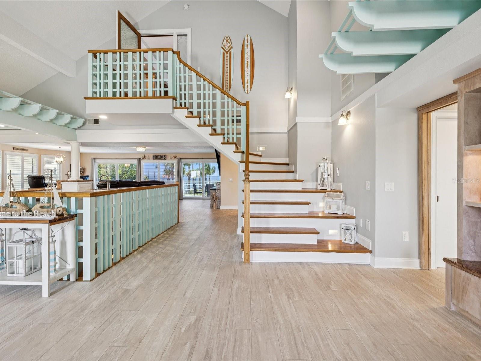 Grand stairs to Primary Bedroom