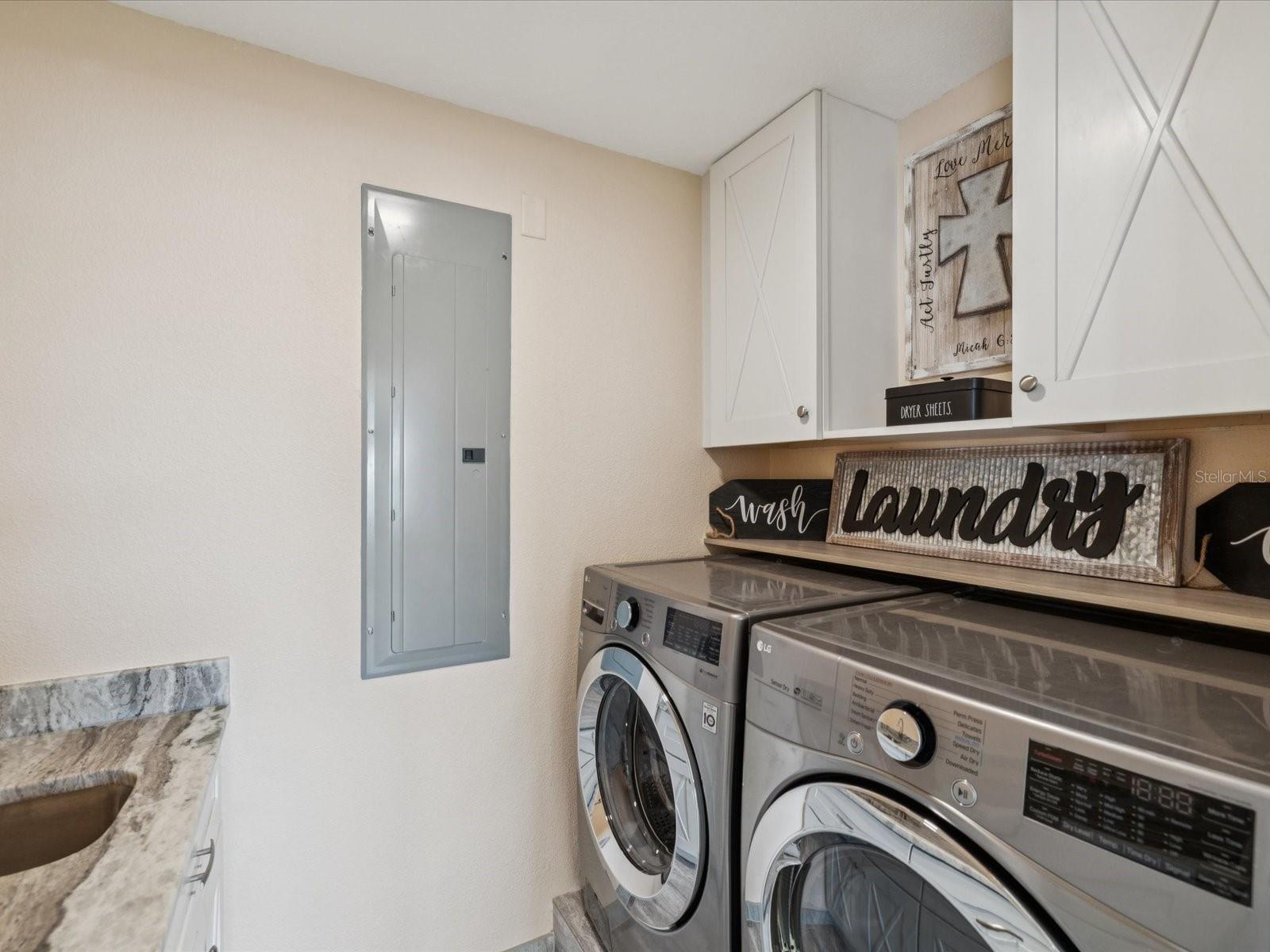 Laundry room with granite folding area