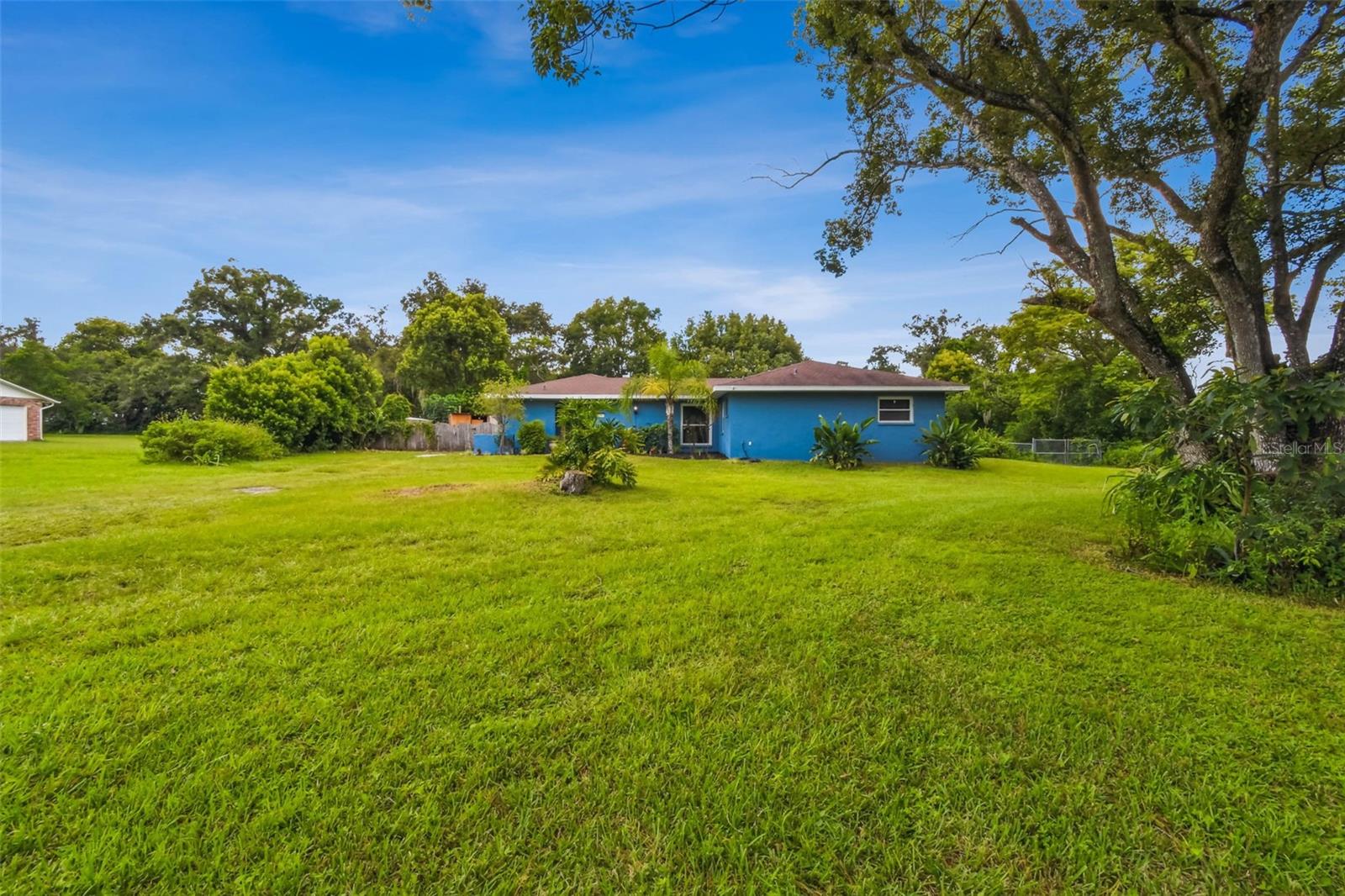 This gorgeous lot is located at the corner of Pretty Pond Road and Chenkin Road. The back yard is completely fenced, and the trees and shrubs that line the perimeter of the property provide plenty of privacy. It feels like you only have one neighbor, and there is certainly plenty of elbow room between the homes.