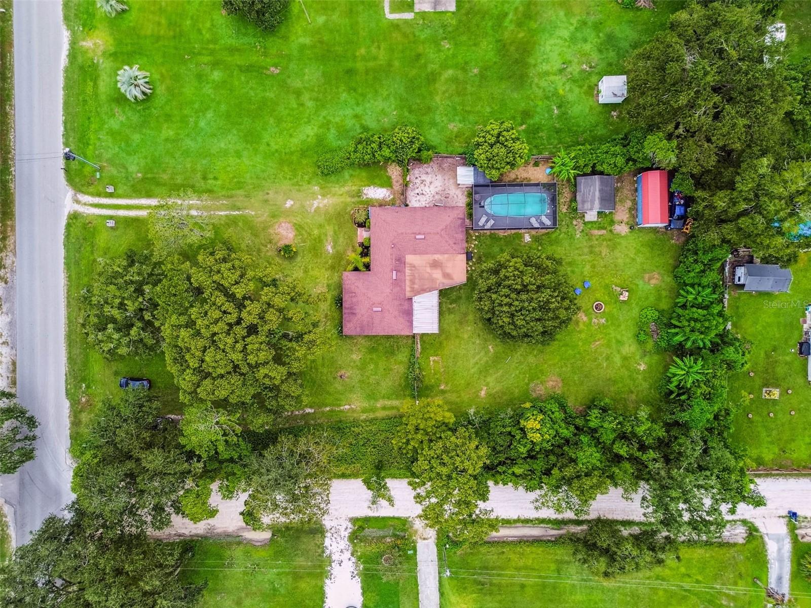 This gorgeous lot is located at the corner of Pretty Pond Road and Chenkin Road. The back yard is completely fenced, and the trees and shrubs that line the perimeter of the property provide plenty of privacy.