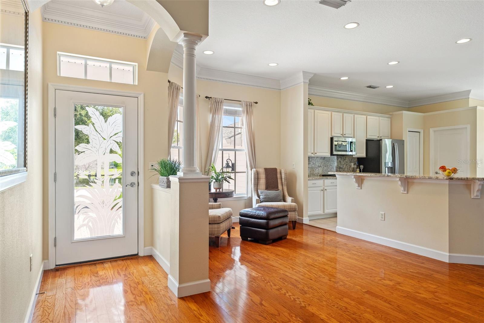 Open-concept design with seamless flow between the living room, kitchen, and dining spaces.