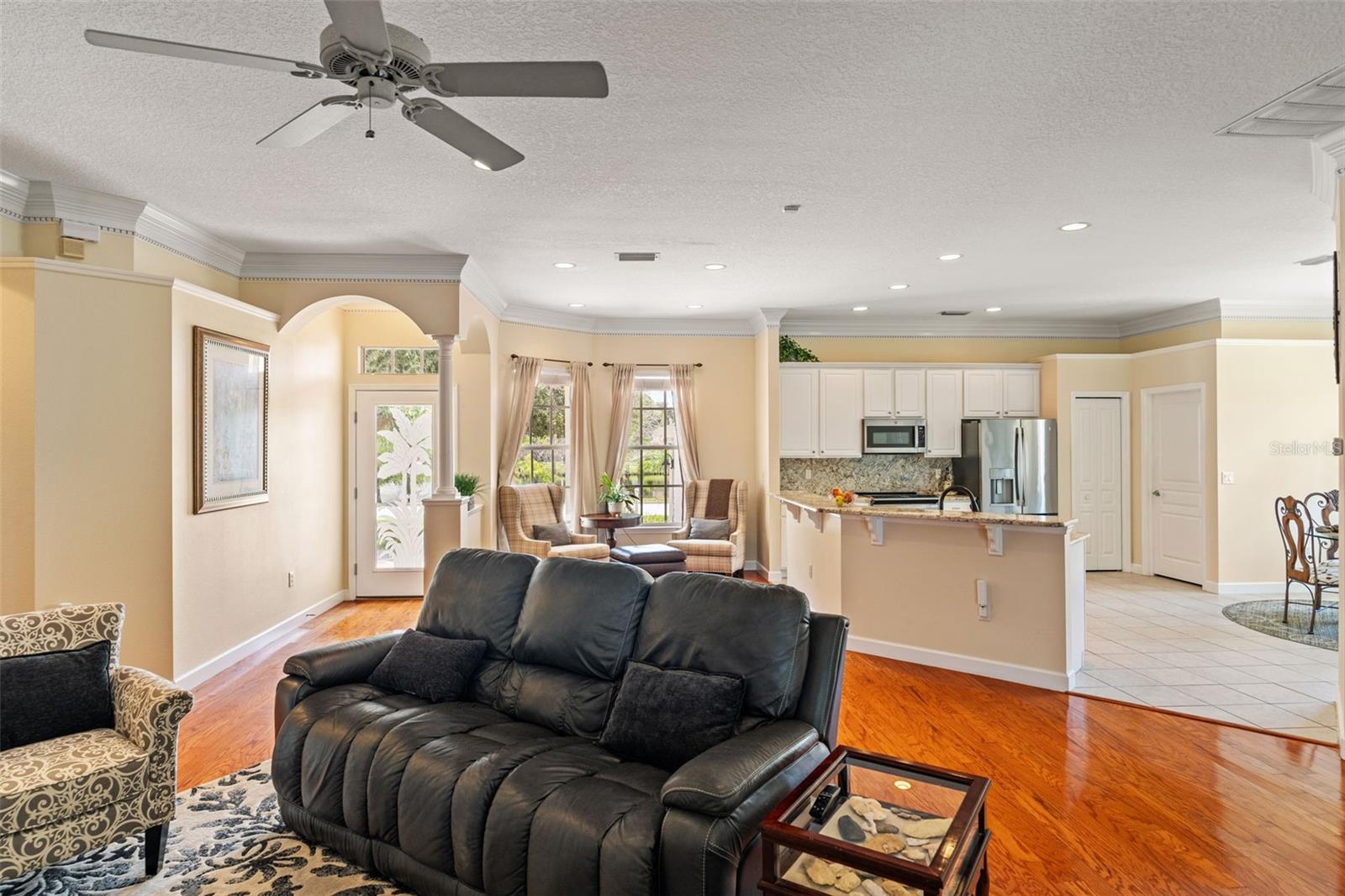 Multiple seating areas and large windows make this space the heart of the home.