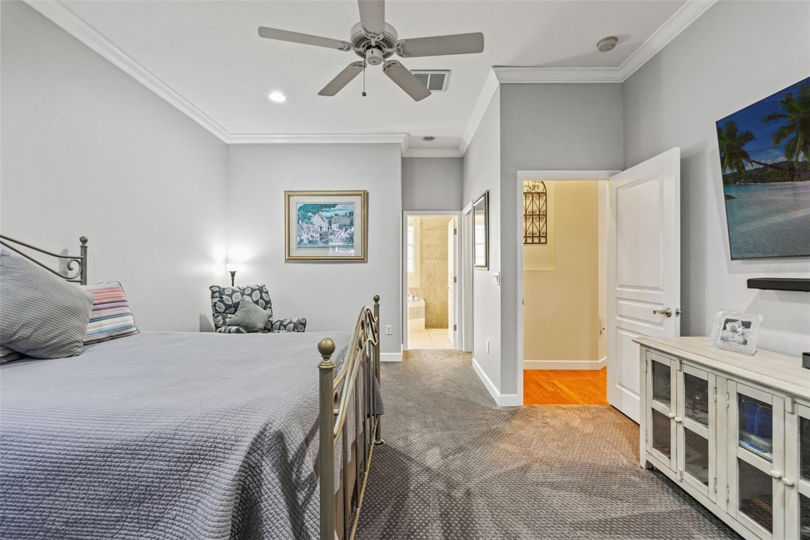 Roomy owner’s suite with space for a sitting area and private access to the en-suite bath.