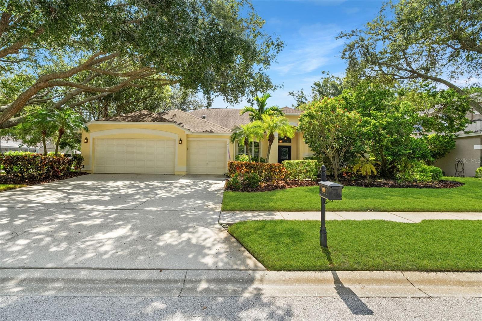 Ample parking and storage await with this large three-car garage, featuring clean architectural lines and convenient access.