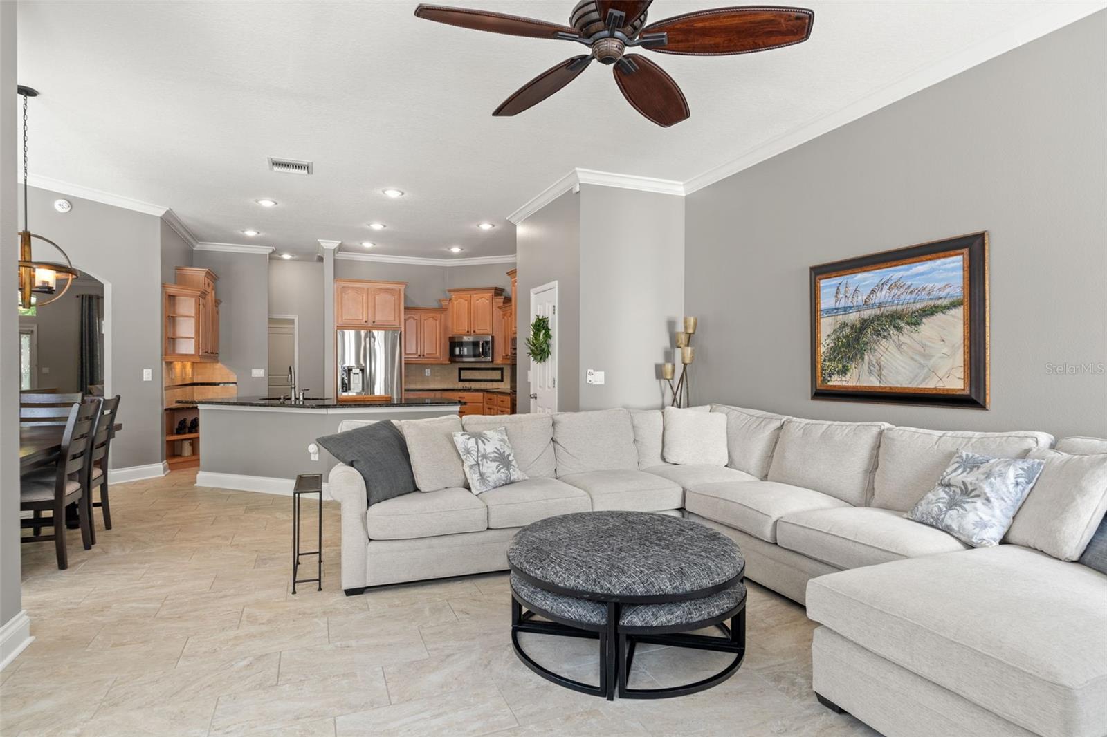 The open floor plan allows the family room to flow effortlessly into the kitchen, making it ideal for entertaining and everyday comfort.