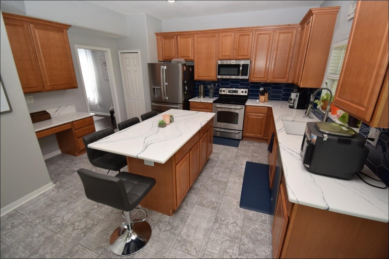 Kitchen with desk workstation