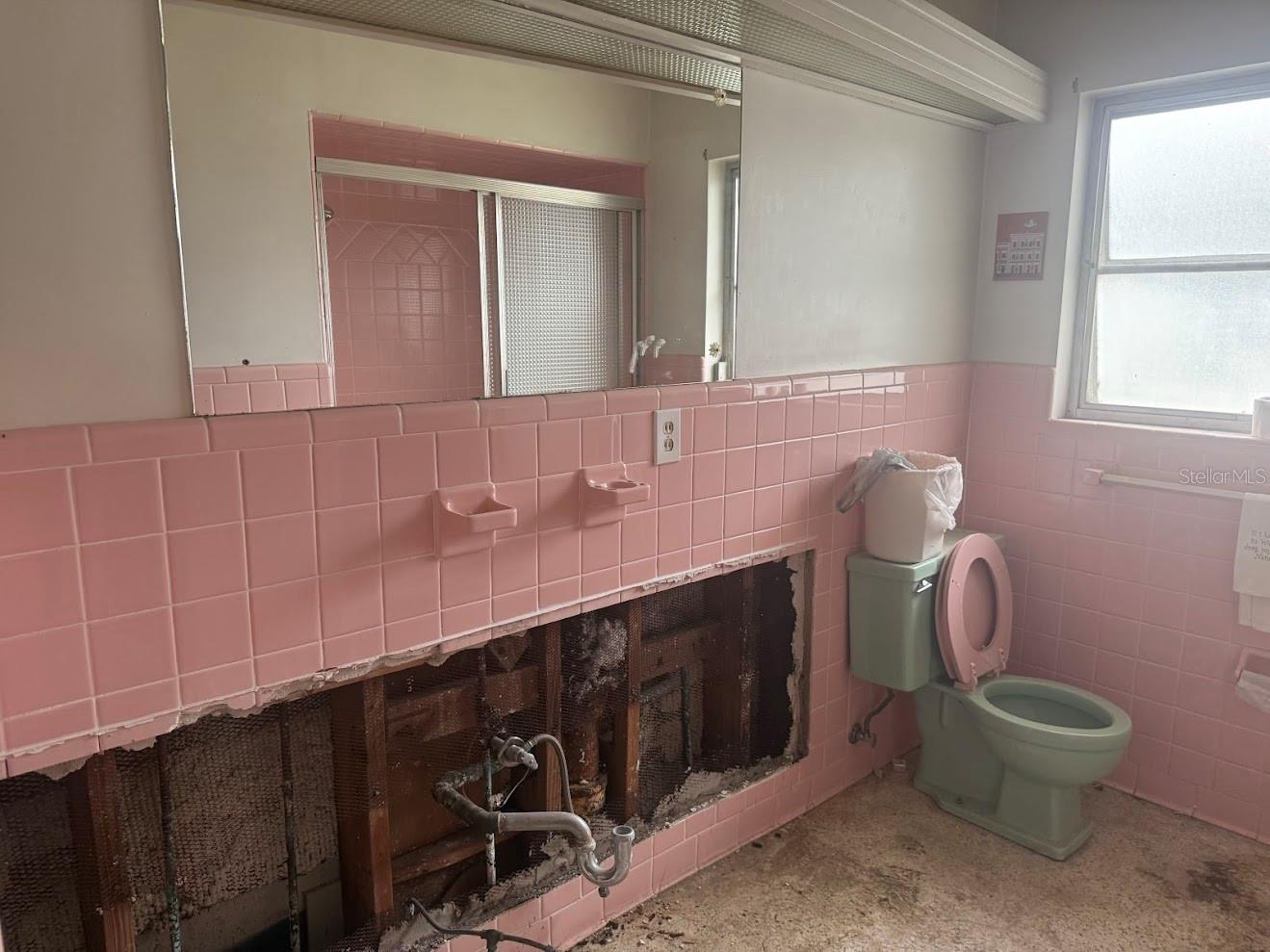 Picture new tiles, double vanity and a bathroom transformation.