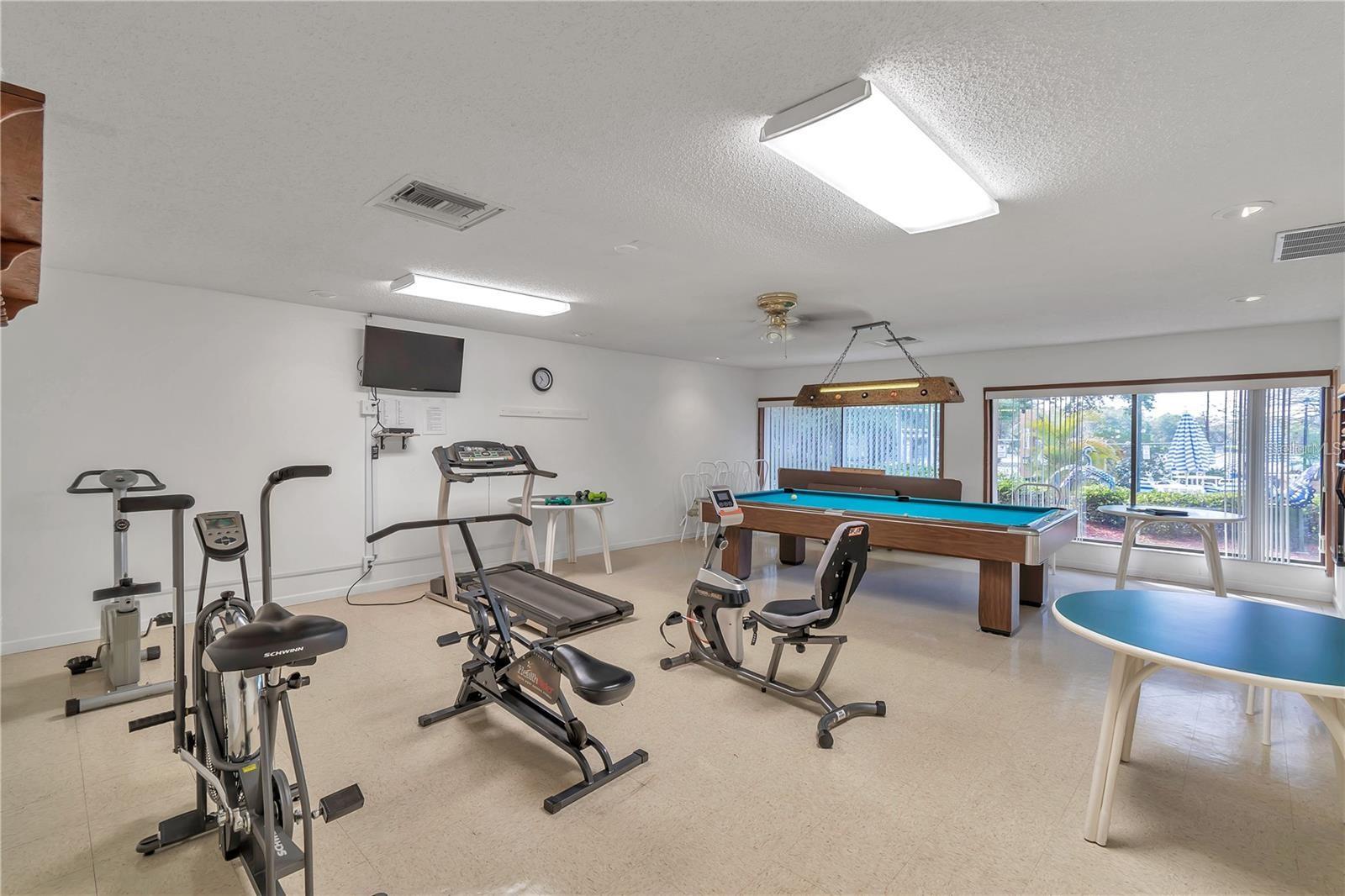 Fitness center and billiards in clubhouse
